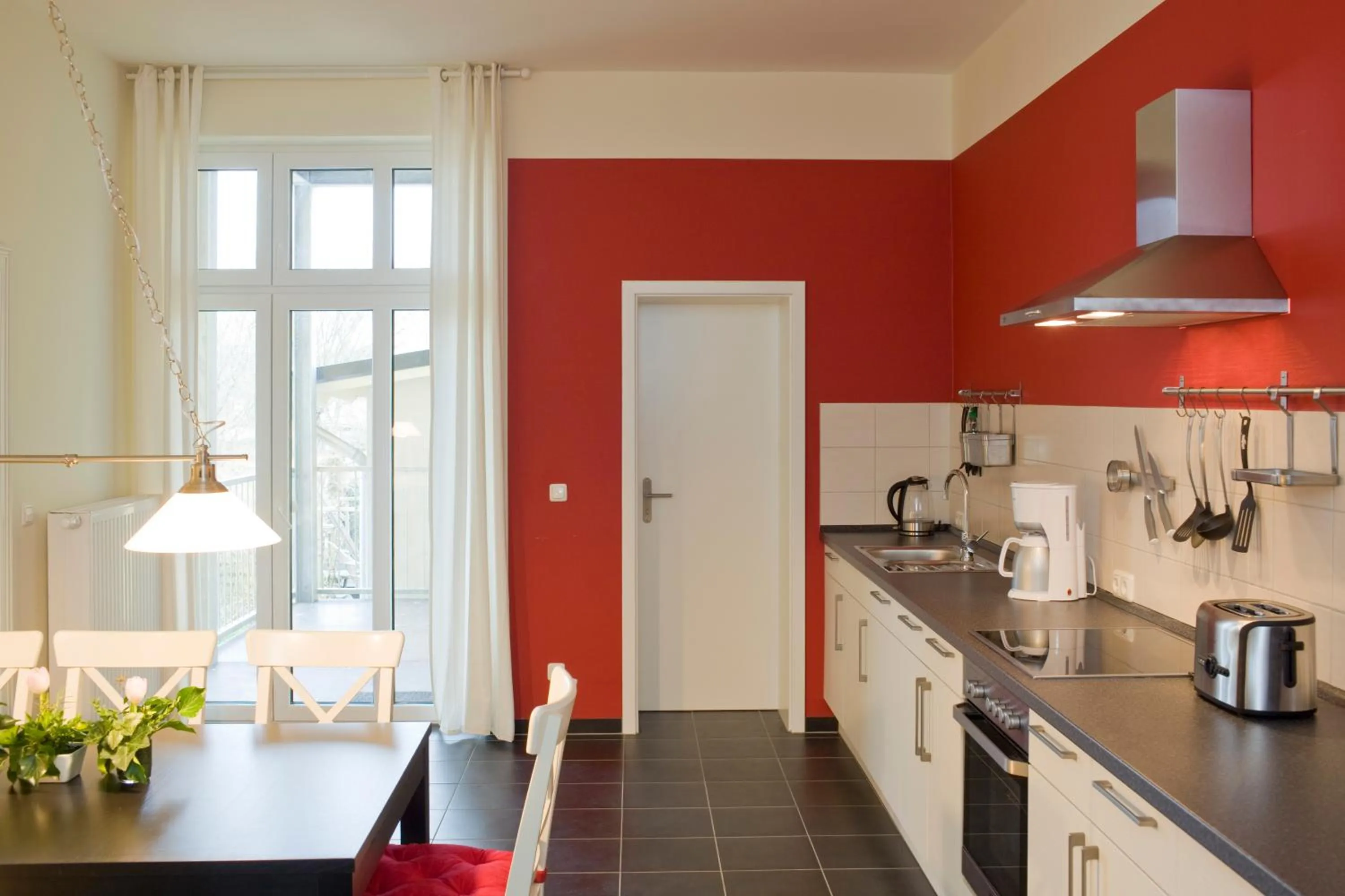 Kitchen or kitchenette in Kulturgasthof Alte Reederei