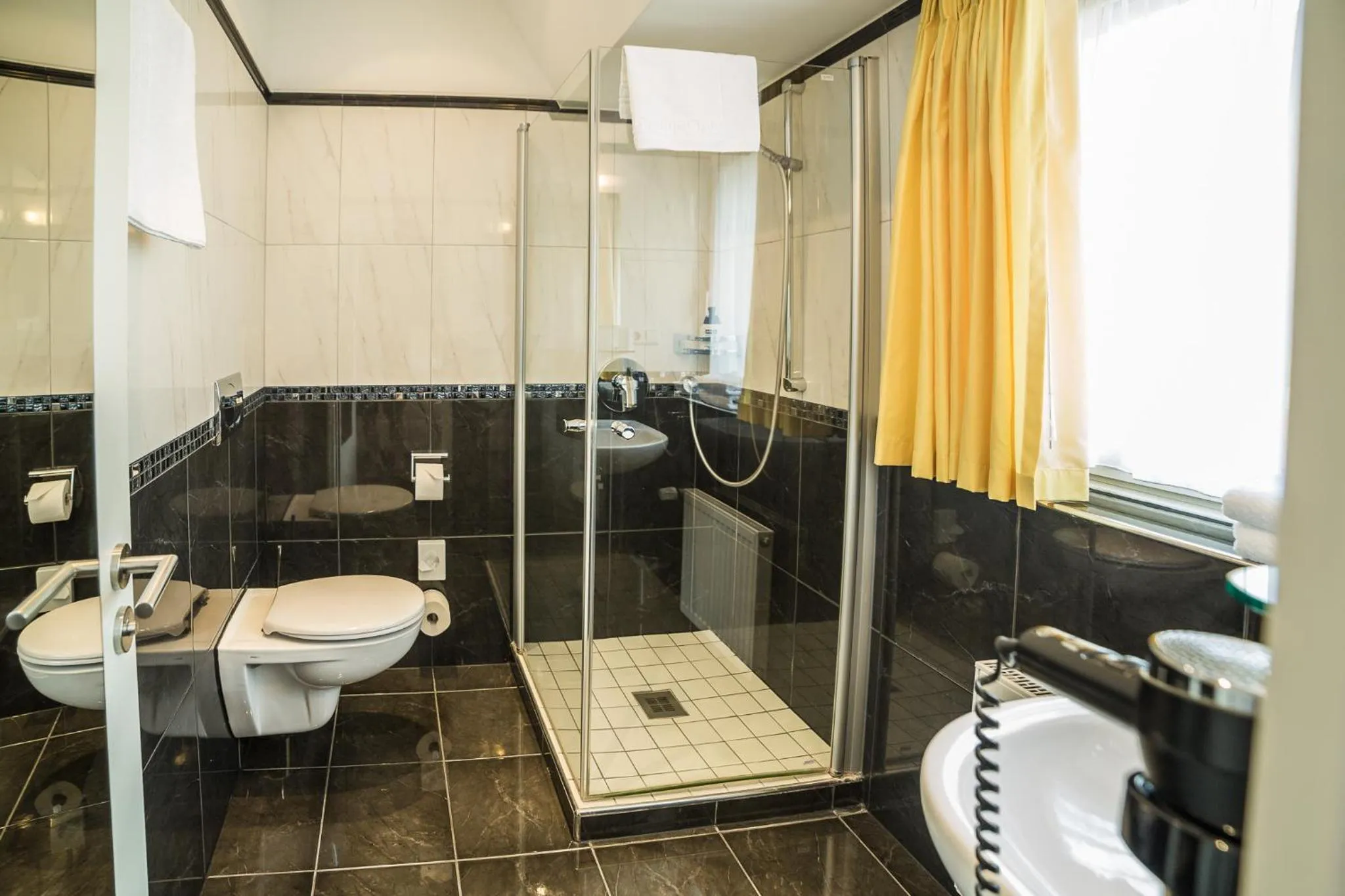 Bathroom in Hotel Linde