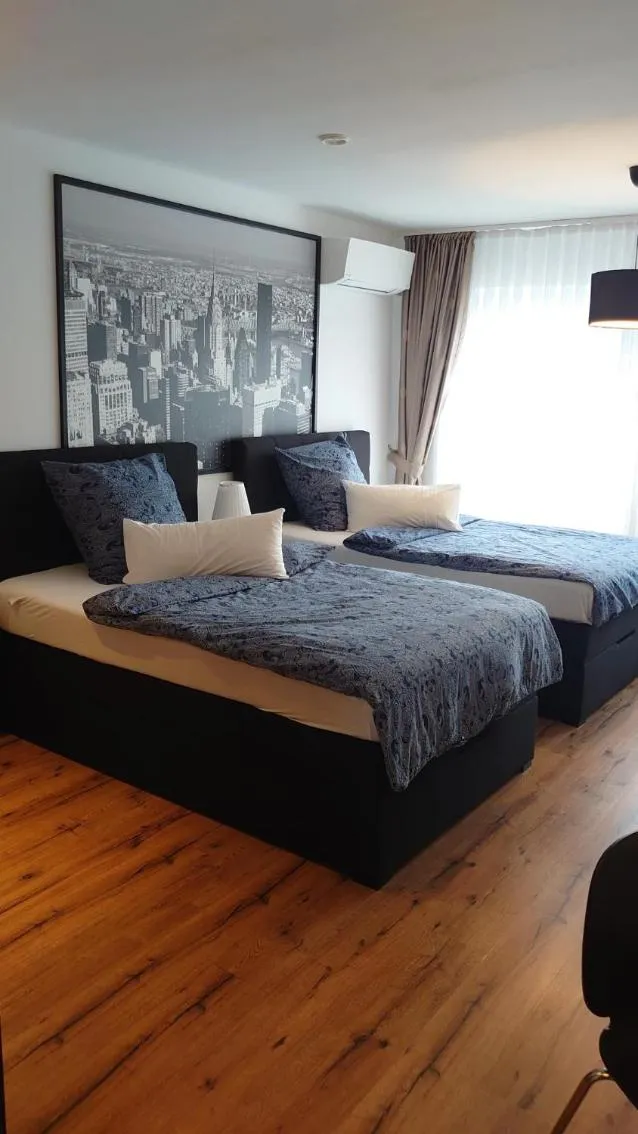 Bed in Maxim Apartments Mainz