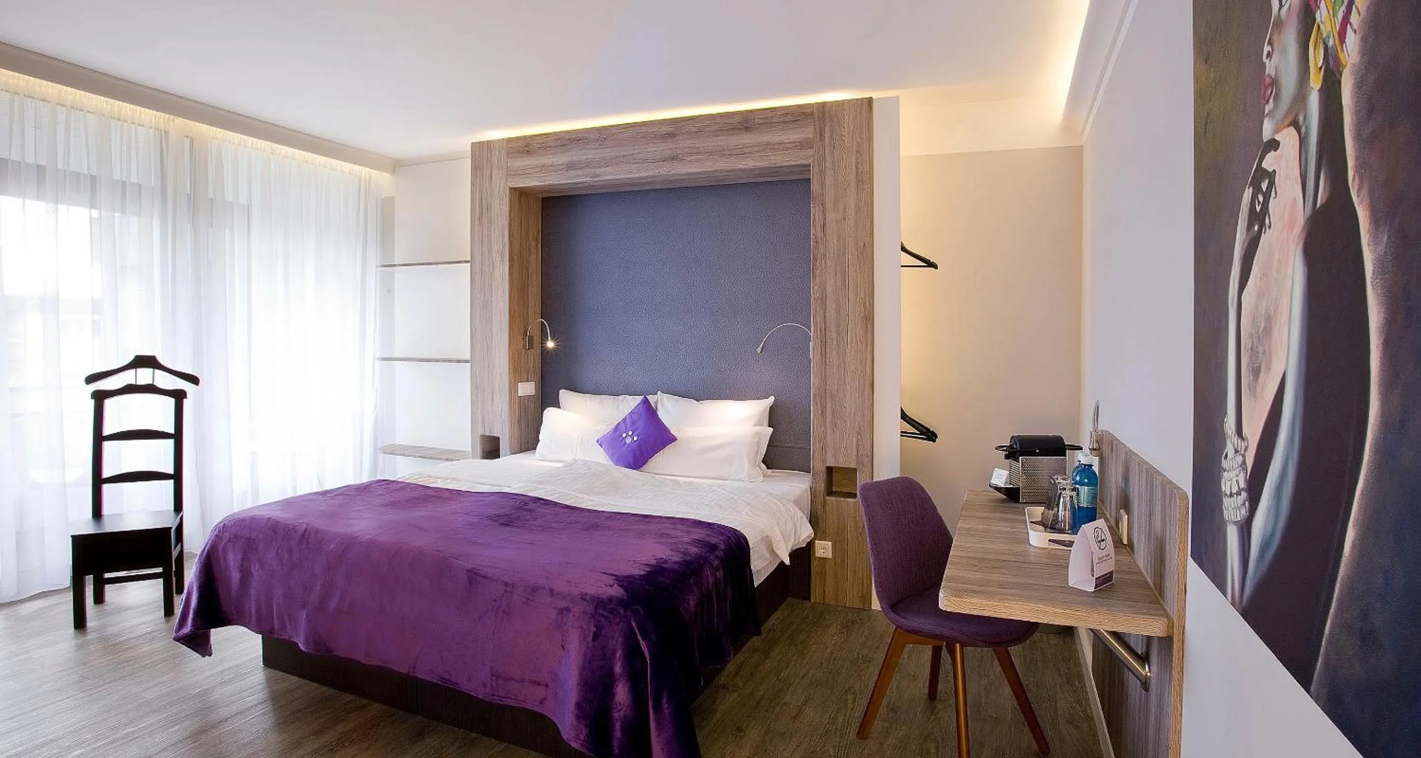 Bed in PLAZA INN stays design Dortmund