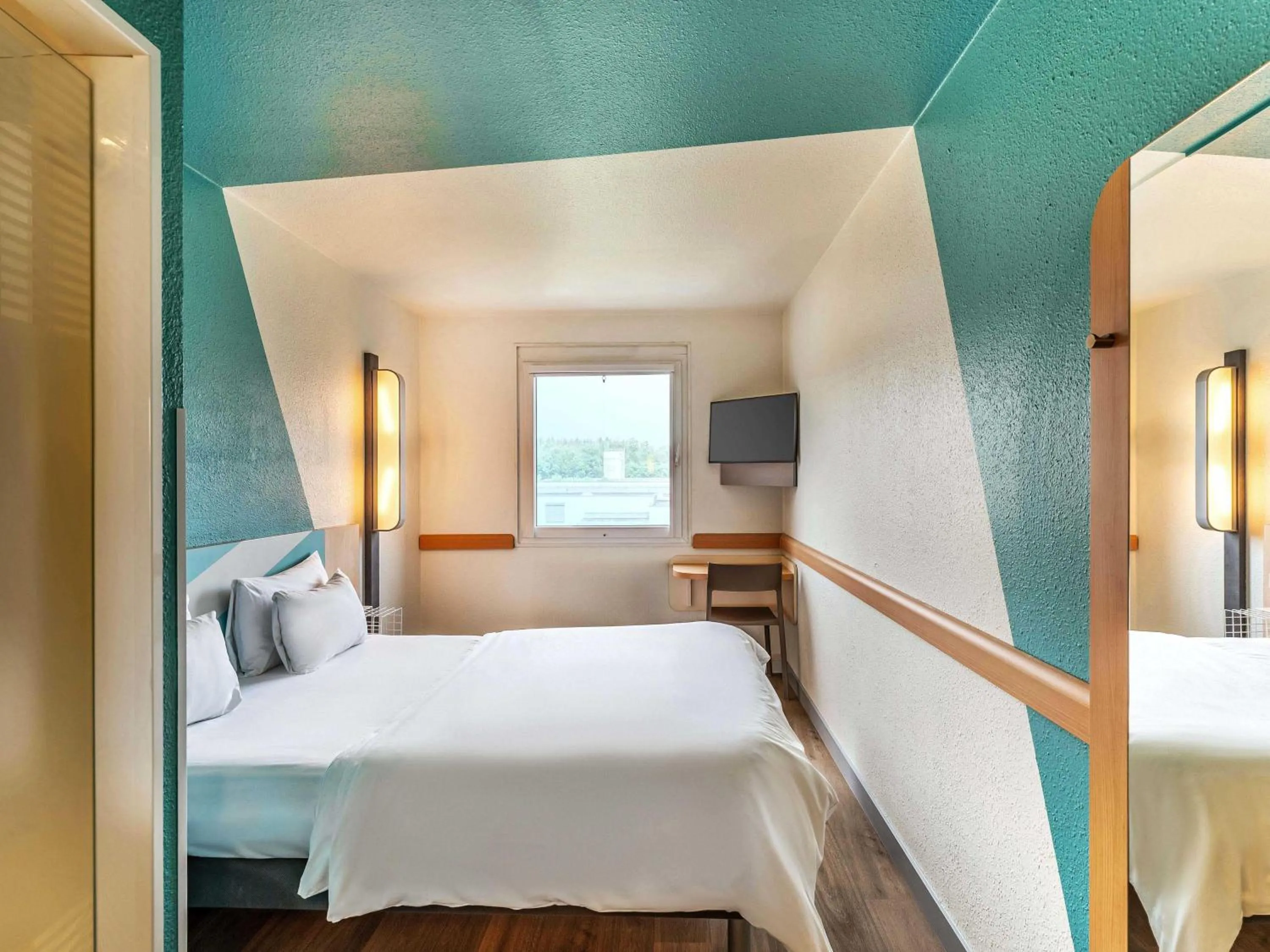 Photo of the whole room, Bed in B&B HOTEL Freiburg-West