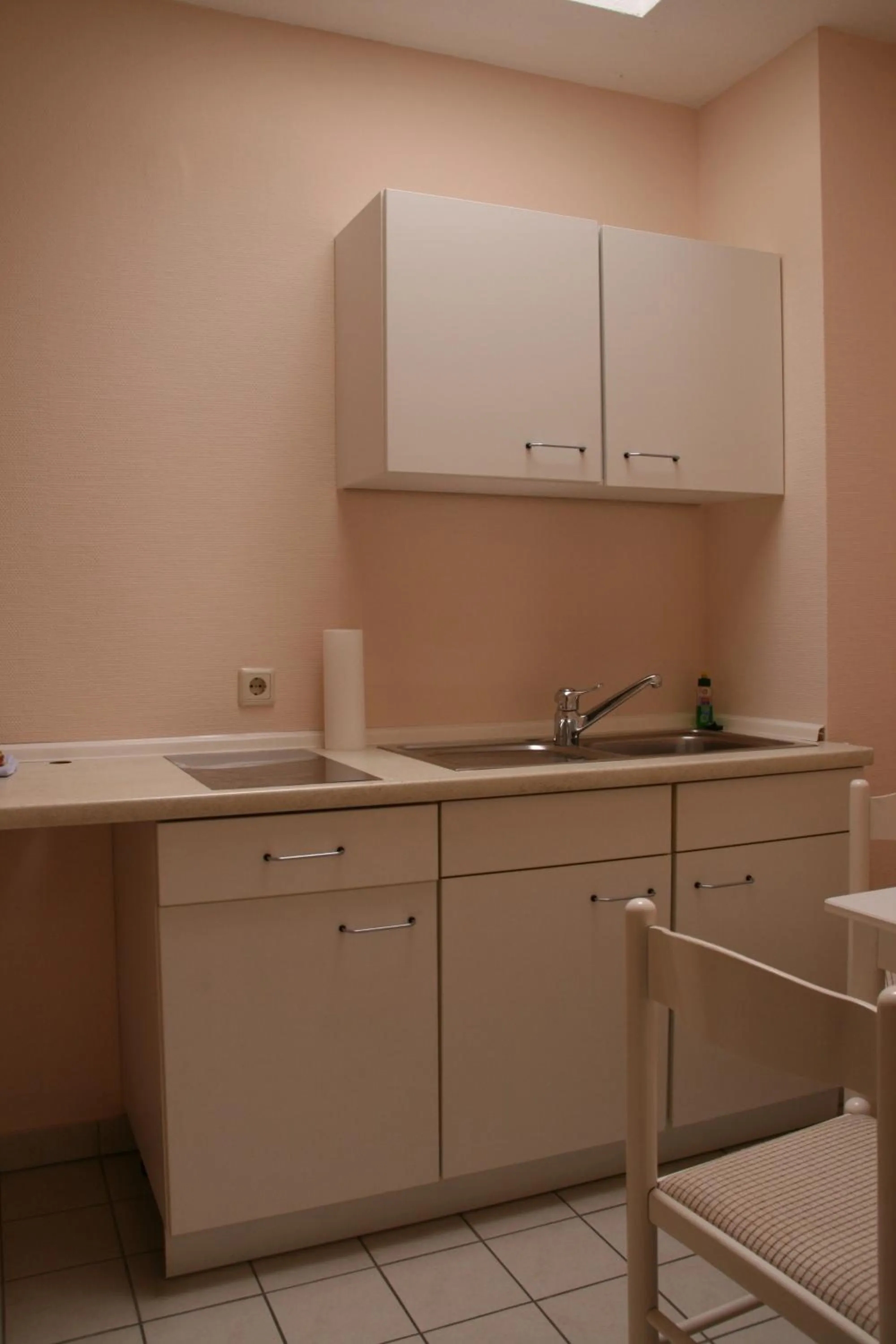 Kitchen or kitchenette in Atrium Hotel