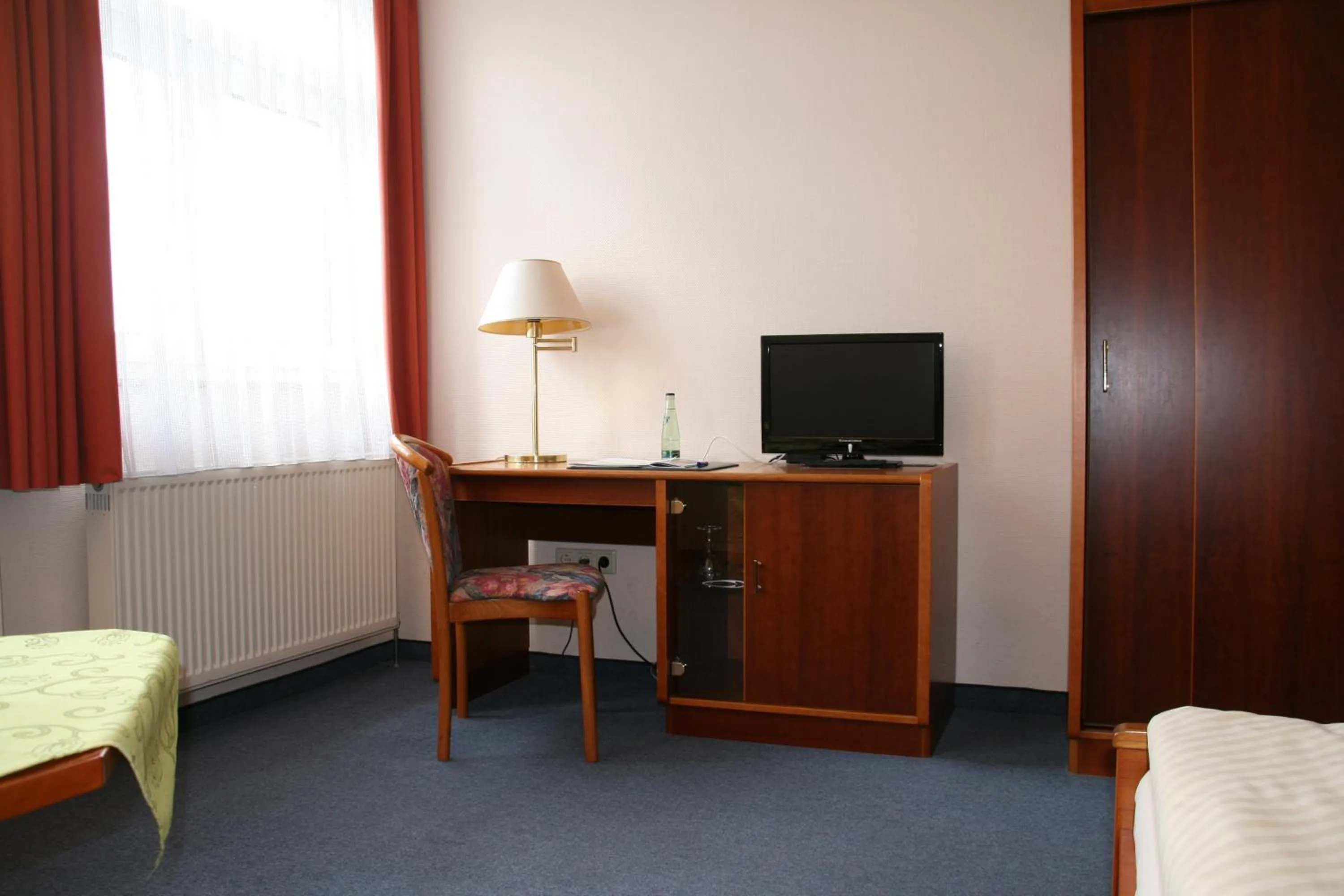 Bedroom in Atrium Hotel