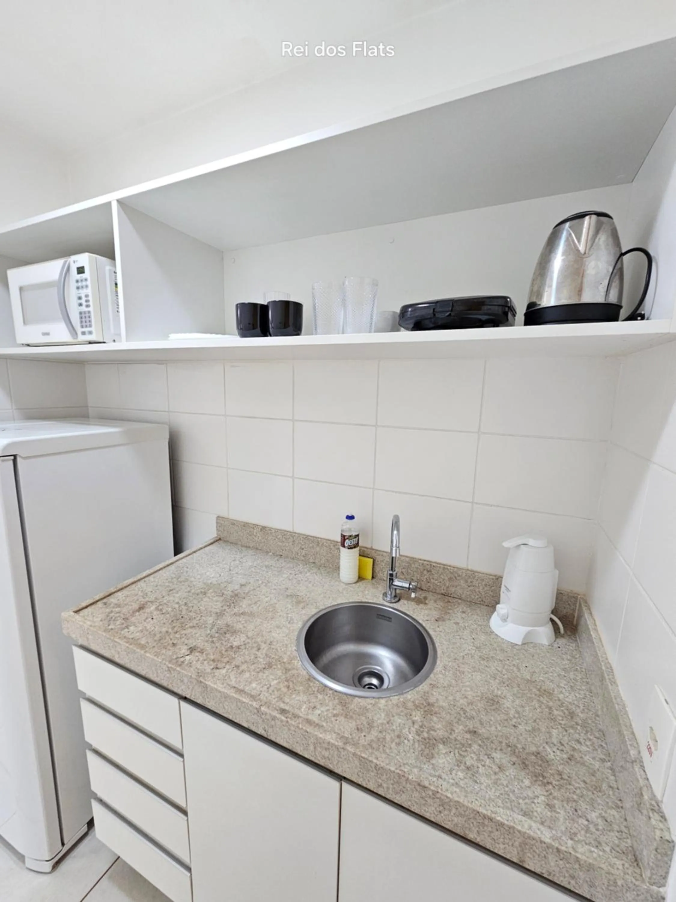 Kitchen or kitchenette in Flat Vision Executivo Premium By Rei dos Flats