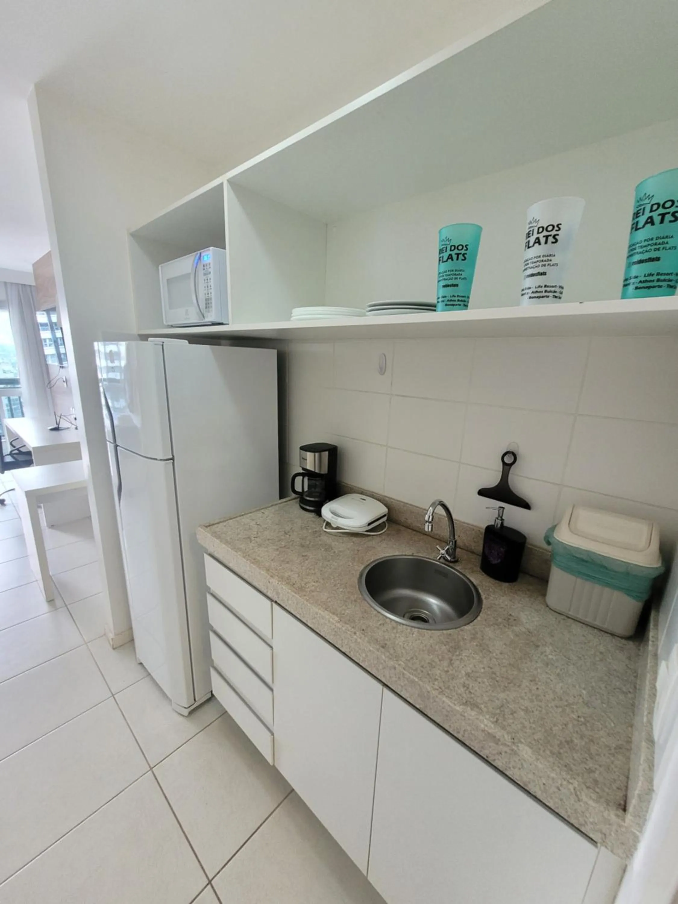 Kitchen or kitchenette in Flat Vision Executivo Premium By Rei dos Flats