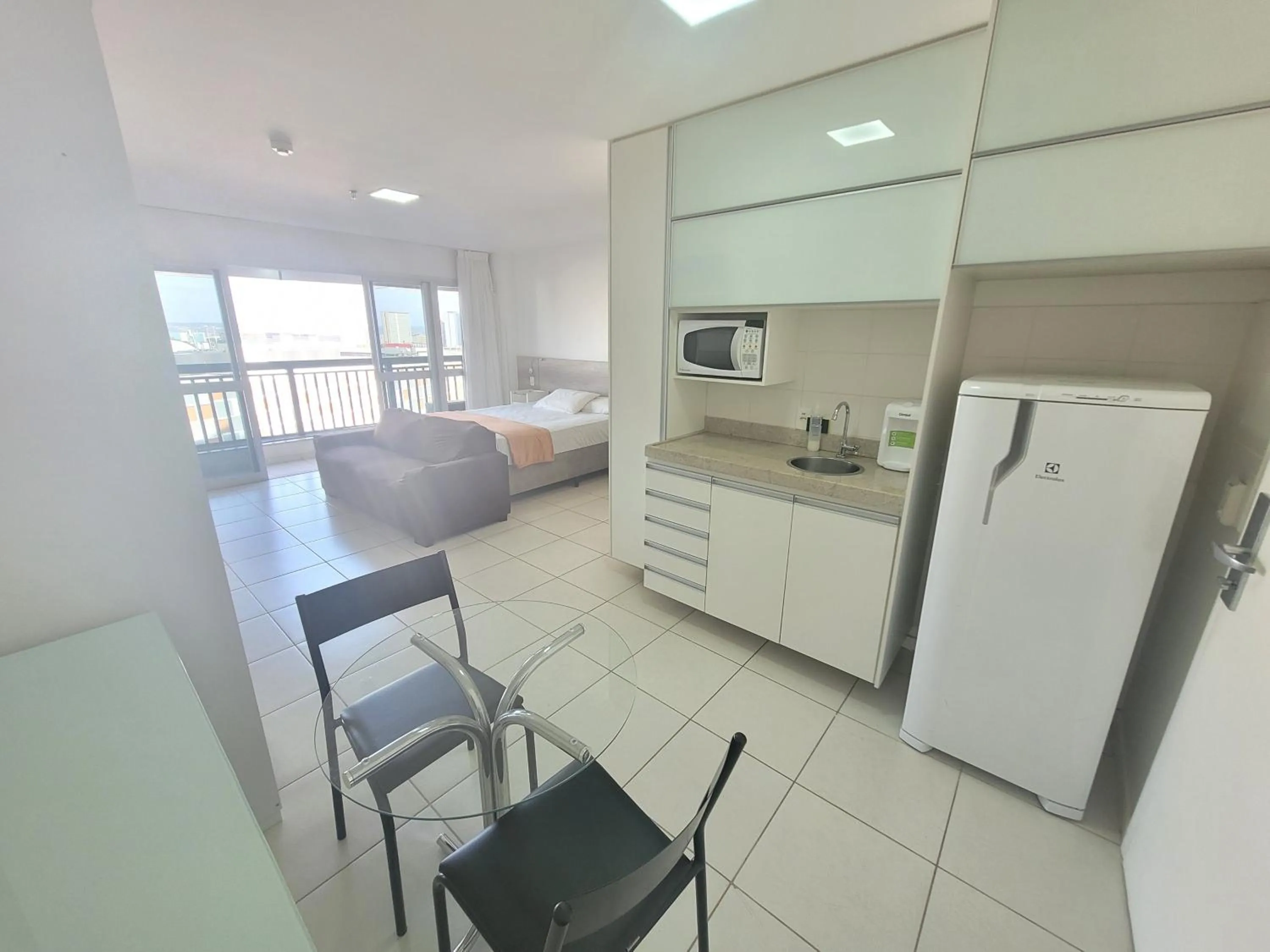 Kitchen or kitchenette in Flat Vision Executivo Premium By Rei dos Flats