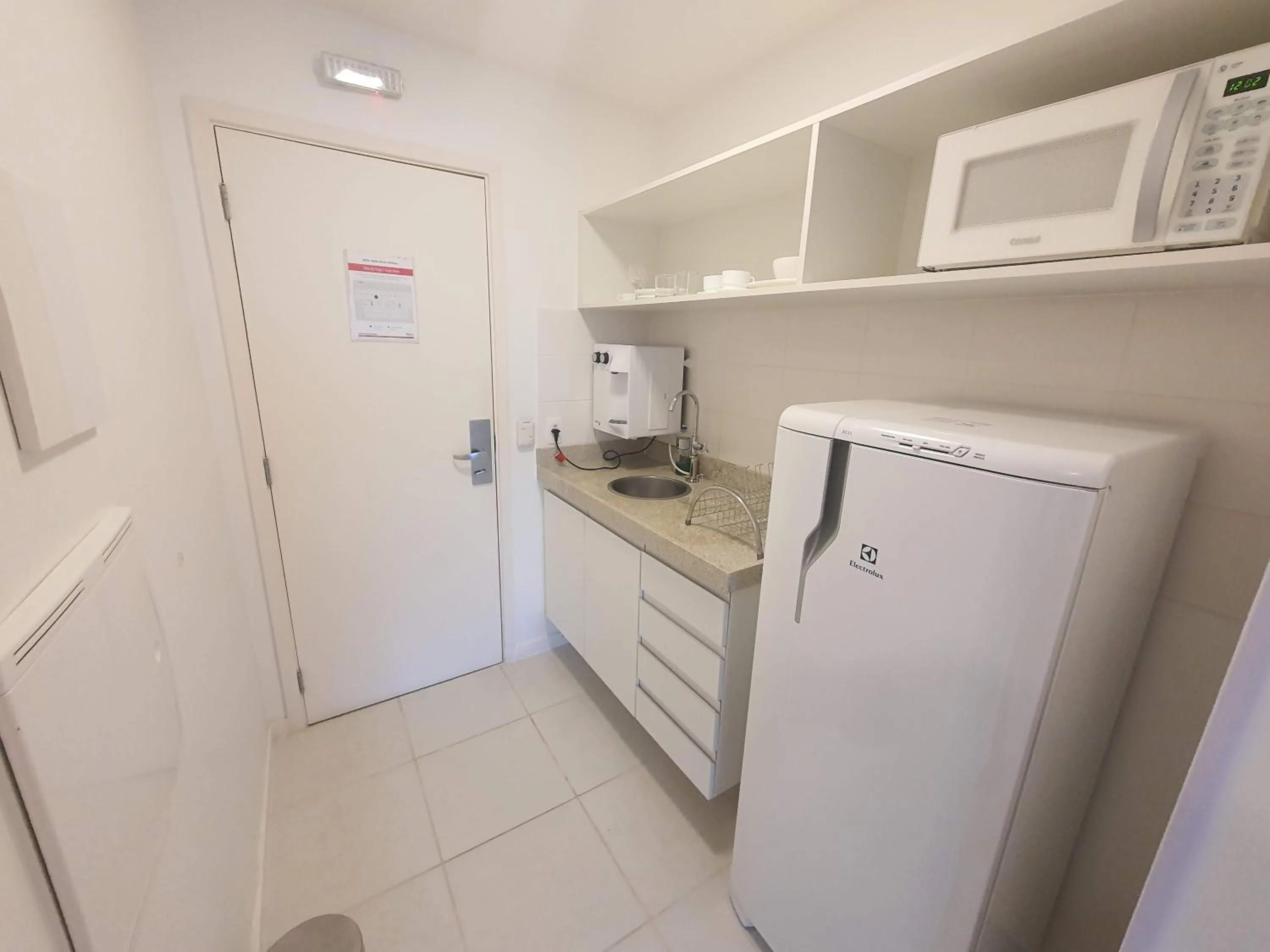 Kitchen or kitchenette in Flat Vision Executivo Premium By Rei dos Flats