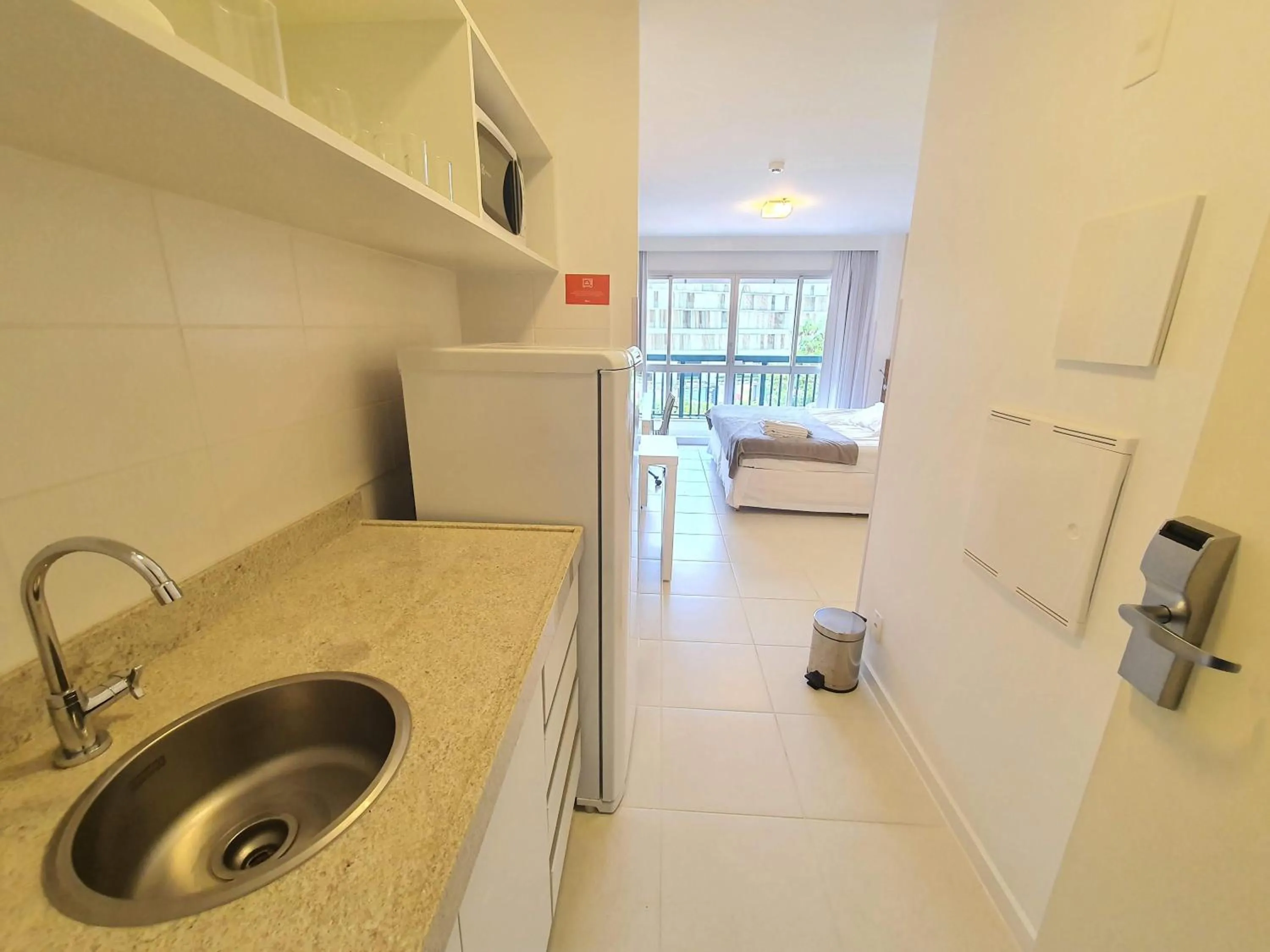 Kitchen or kitchenette in Flat Vision Executivo Premium By Rei dos Flats