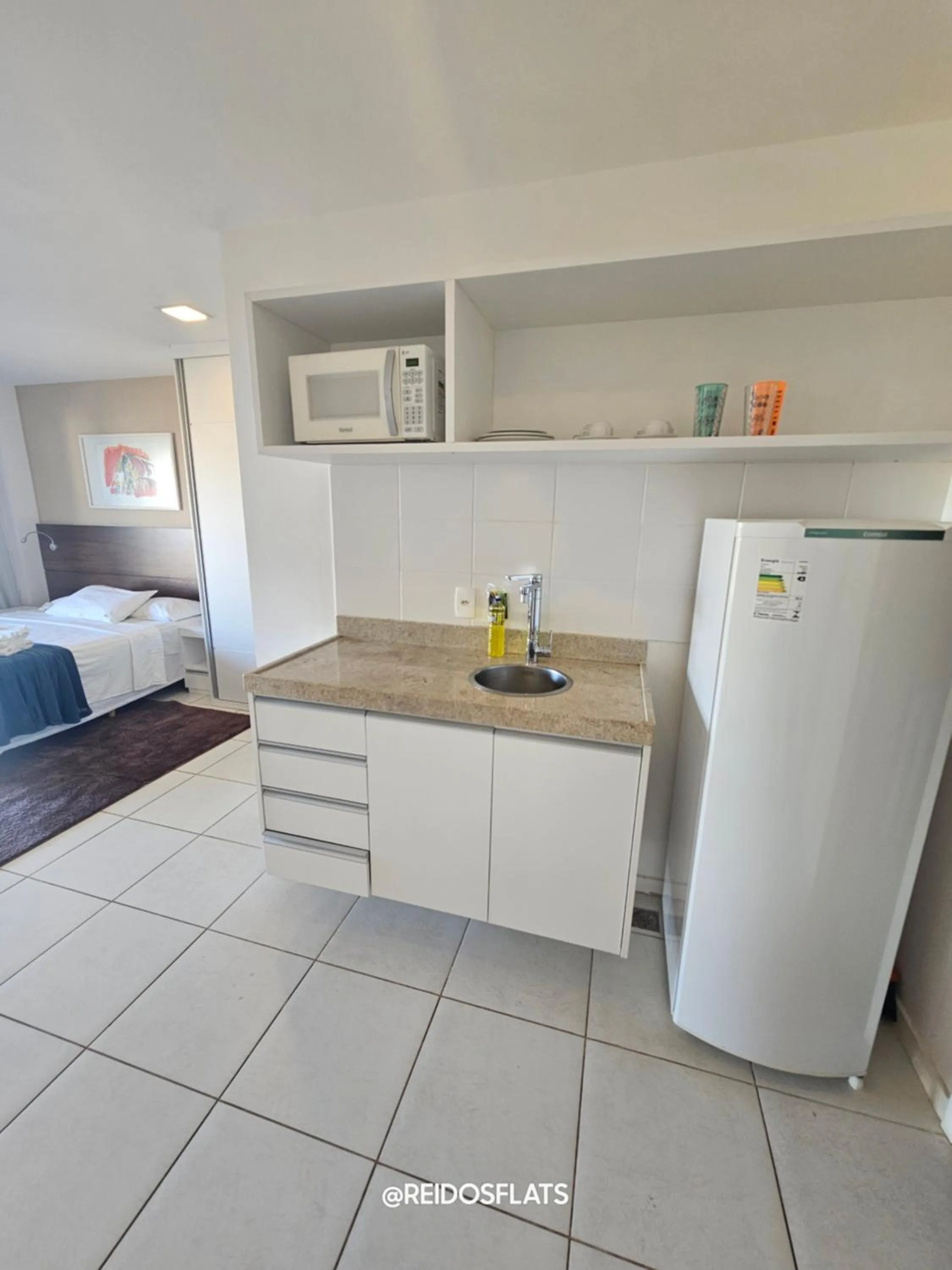 Kitchen or kitchenette in Flat Vision Executivo Premium By Rei dos Flats