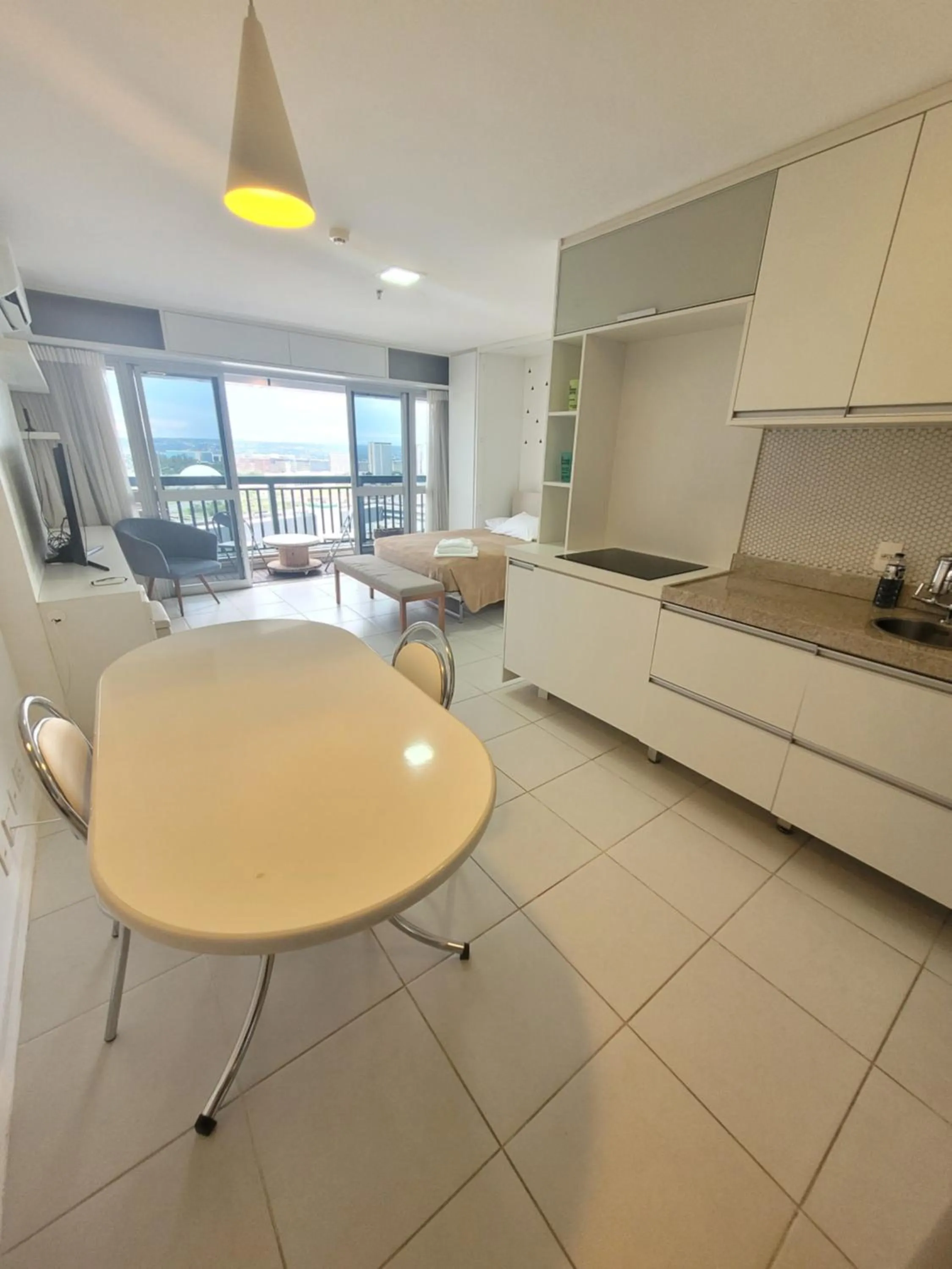 Dining area in Flat Vision Executivo Premium By Rei dos Flats