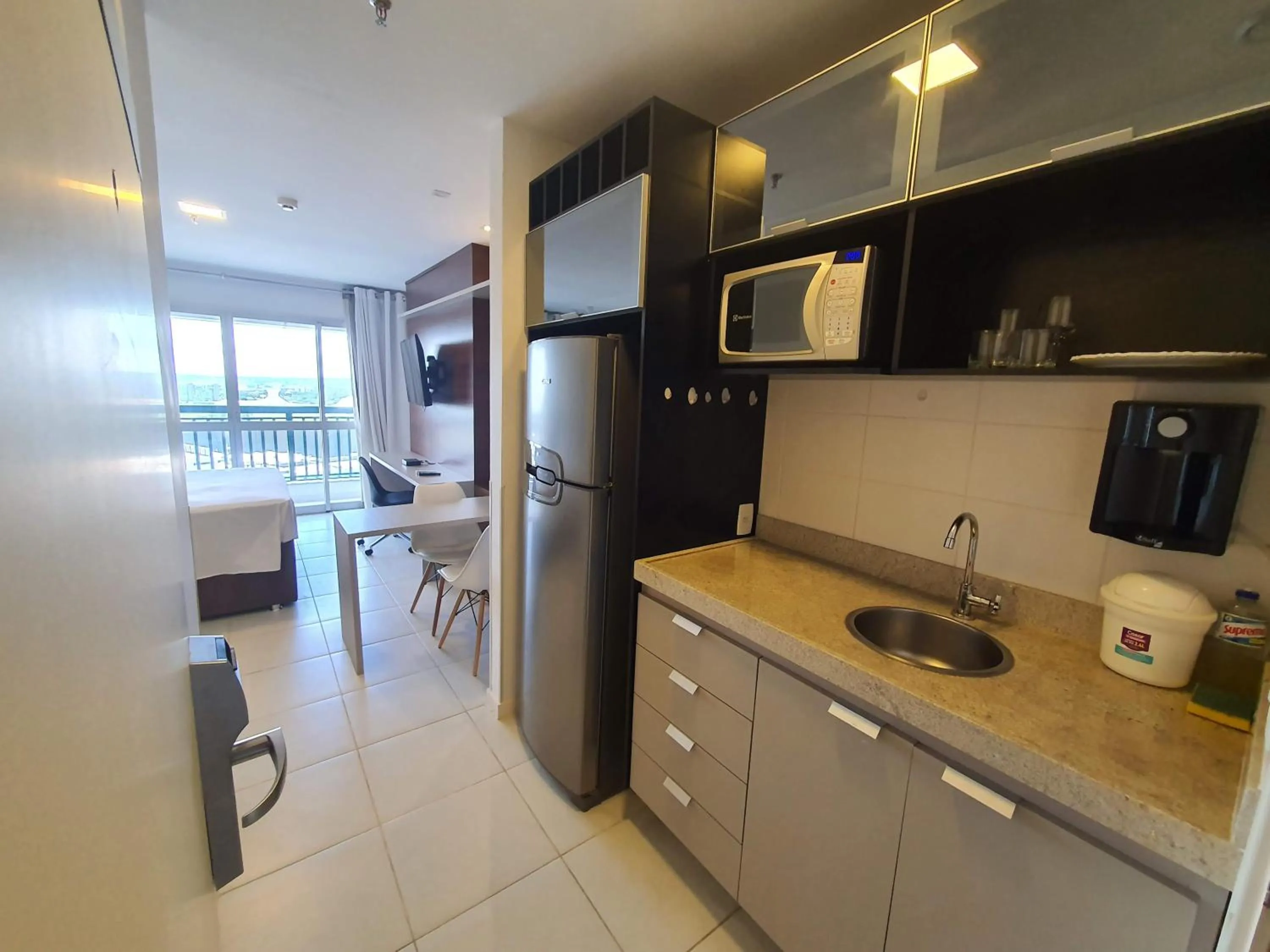 Coffee/tea facilities in Flat Vision Executivo Premium By Rei dos Flats