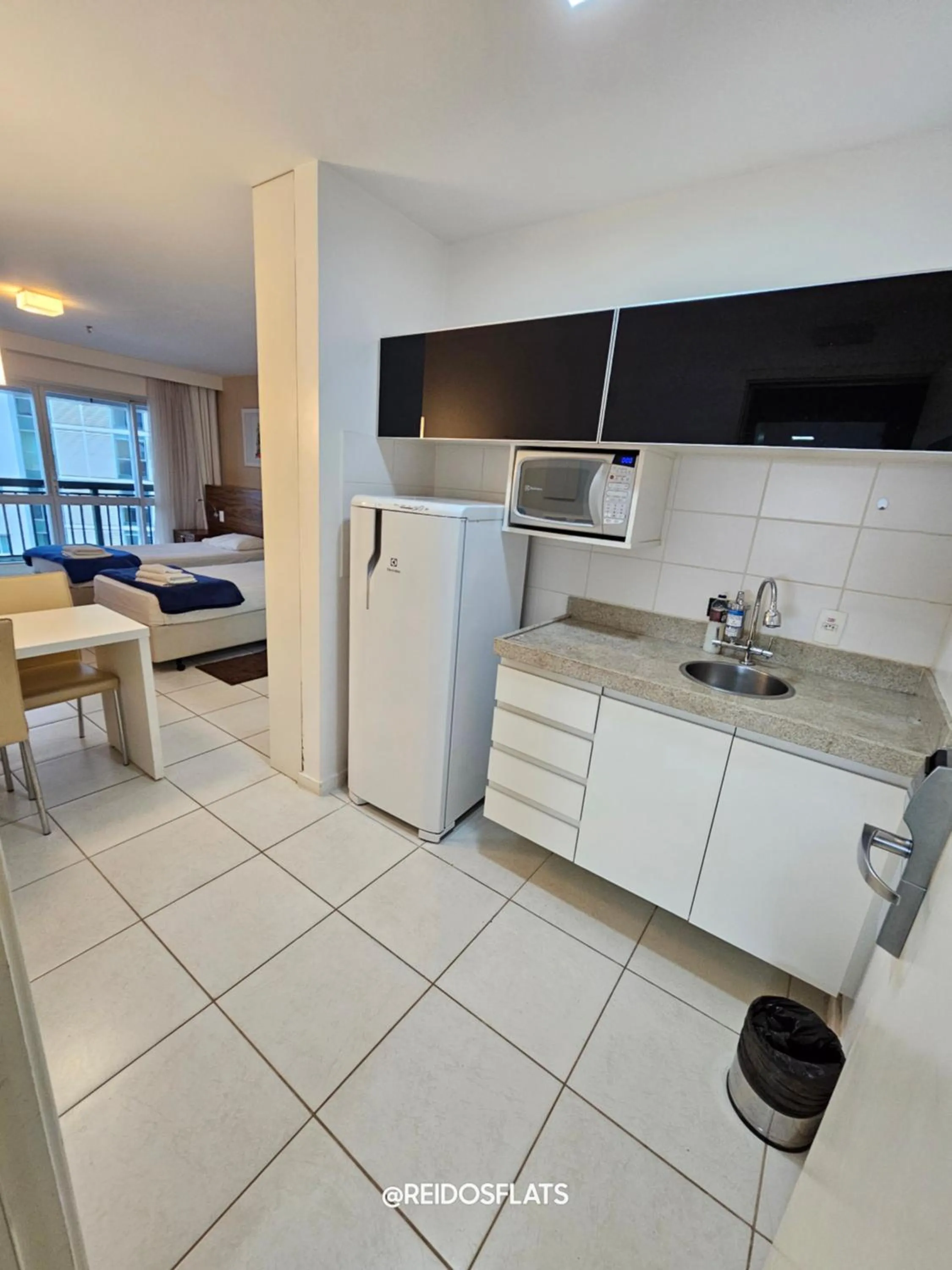 Kitchen or kitchenette in Flat Vision Executivo Premium By Rei dos Flats