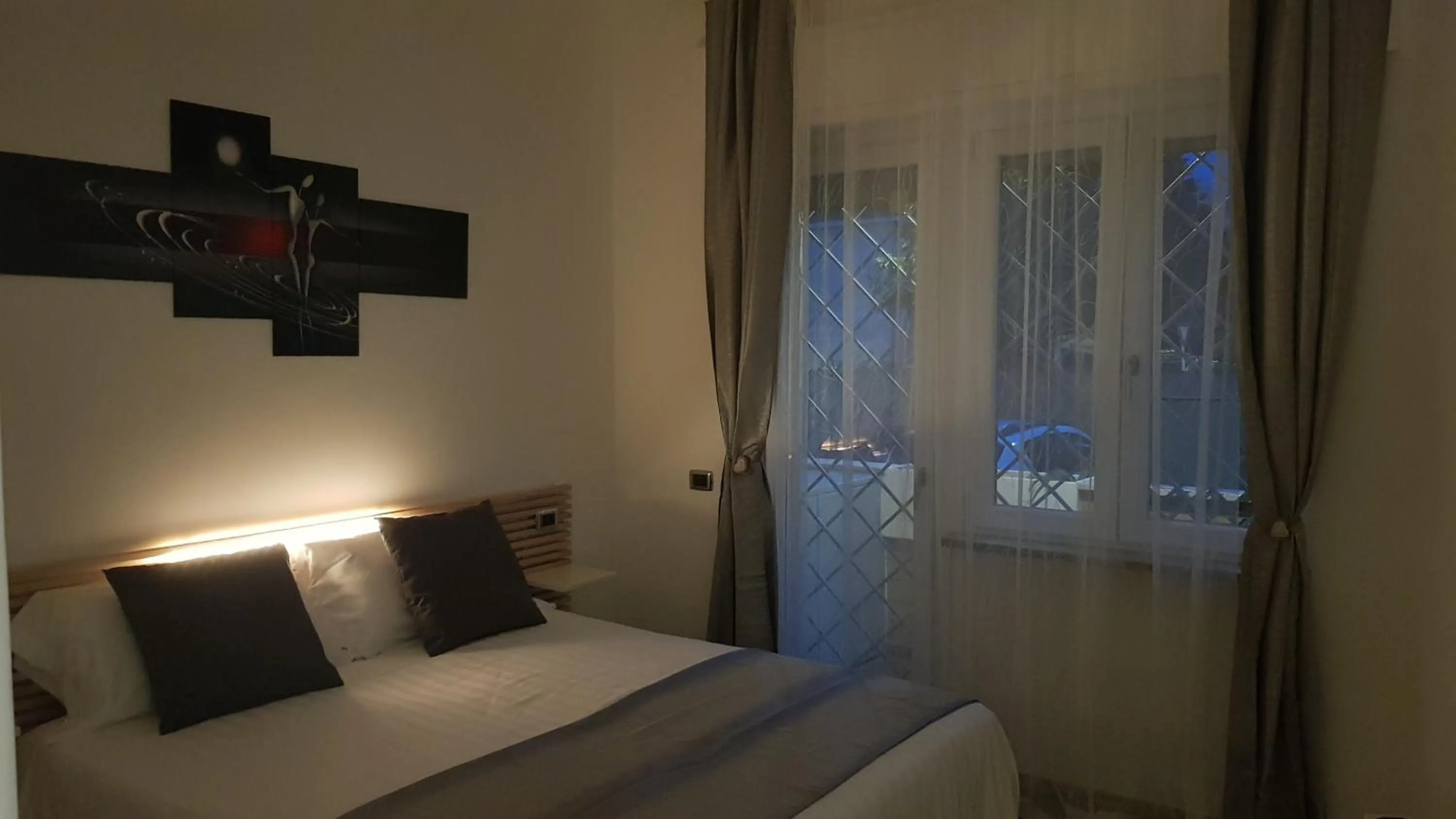 Bed in THAT'S AMORE FIUMICINO Airport