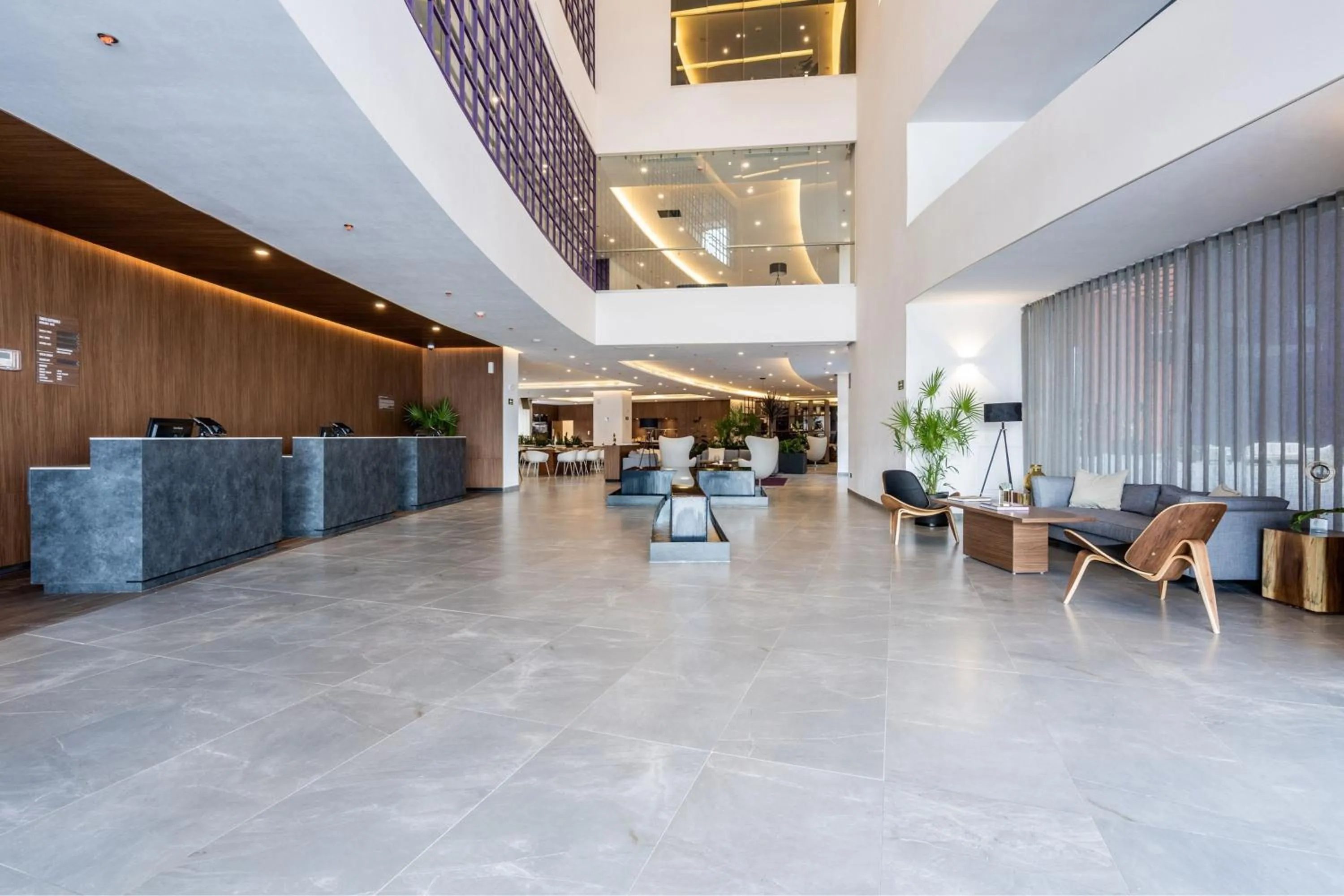 Lobby or reception in City Express Plus by Marriott San Luis Potosi