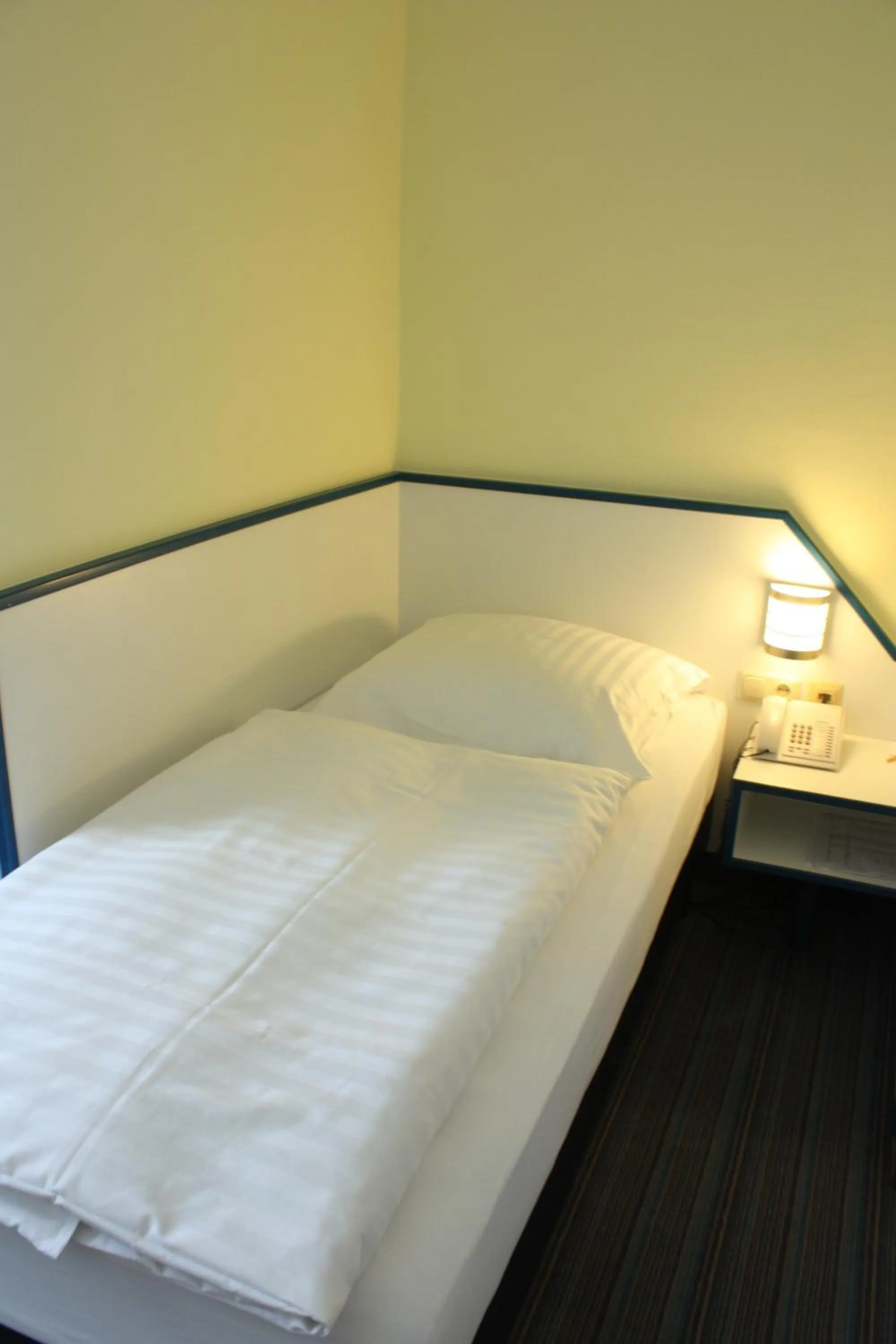 Bed in Hotel City Kräme am Römer - Self Check In