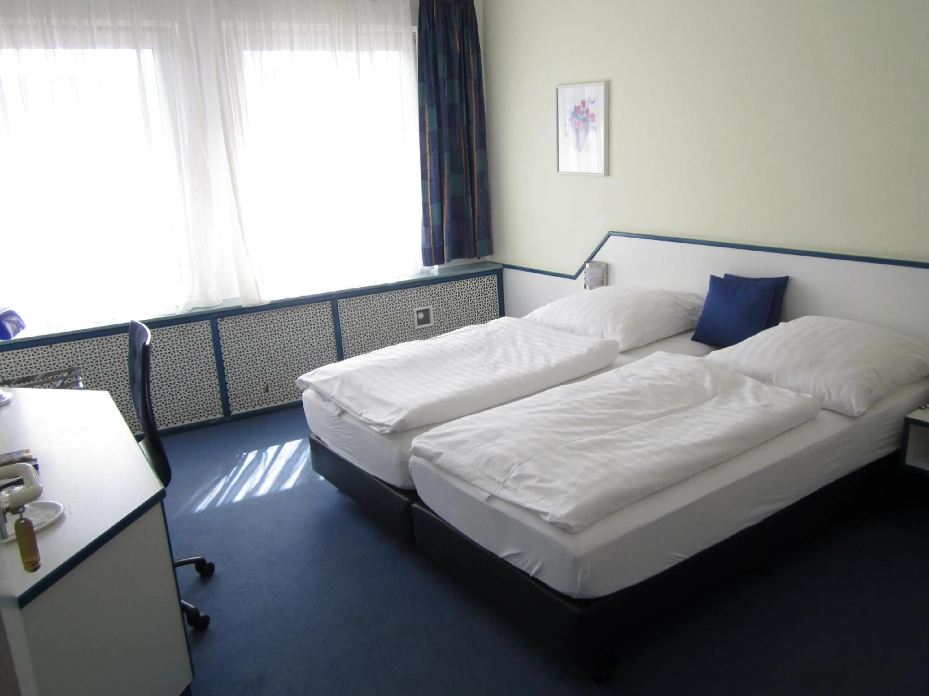 Photo of the whole room, Bed in Hotel City Kräme am Römer - Self Check In