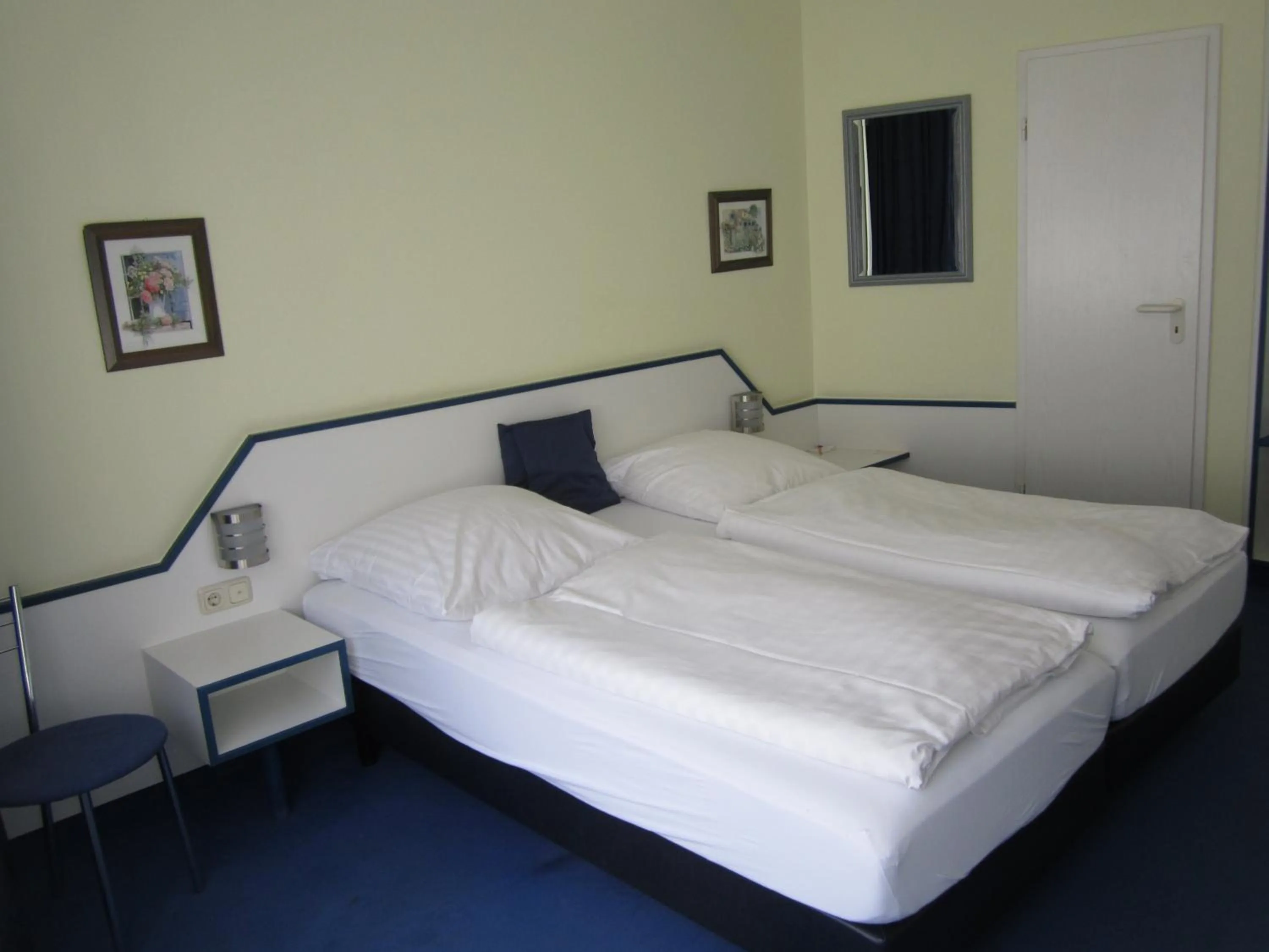 Bed in Hotel City Kräme am Römer - Self Check In