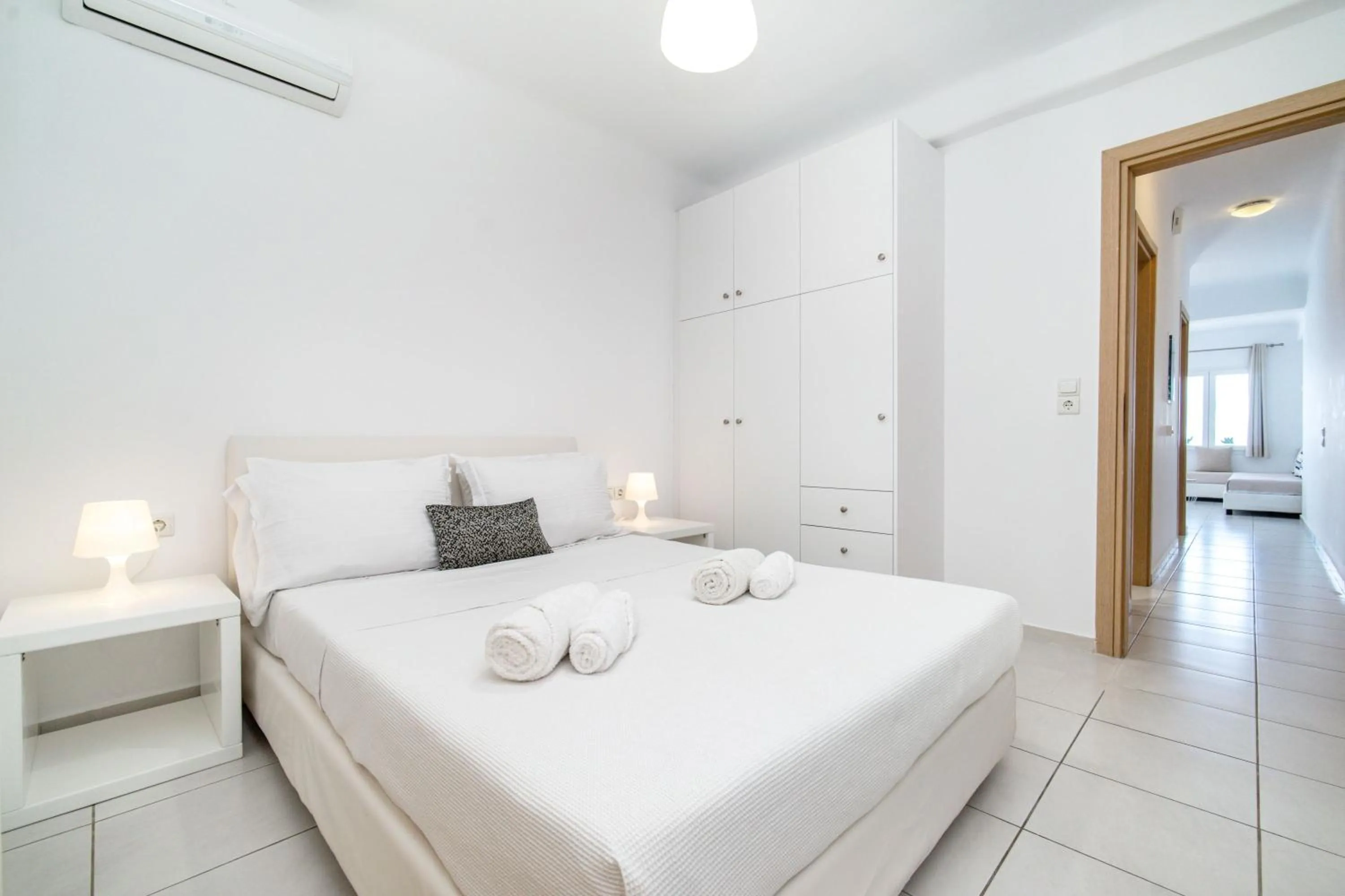 Bed in Overview Mykonos Apartments