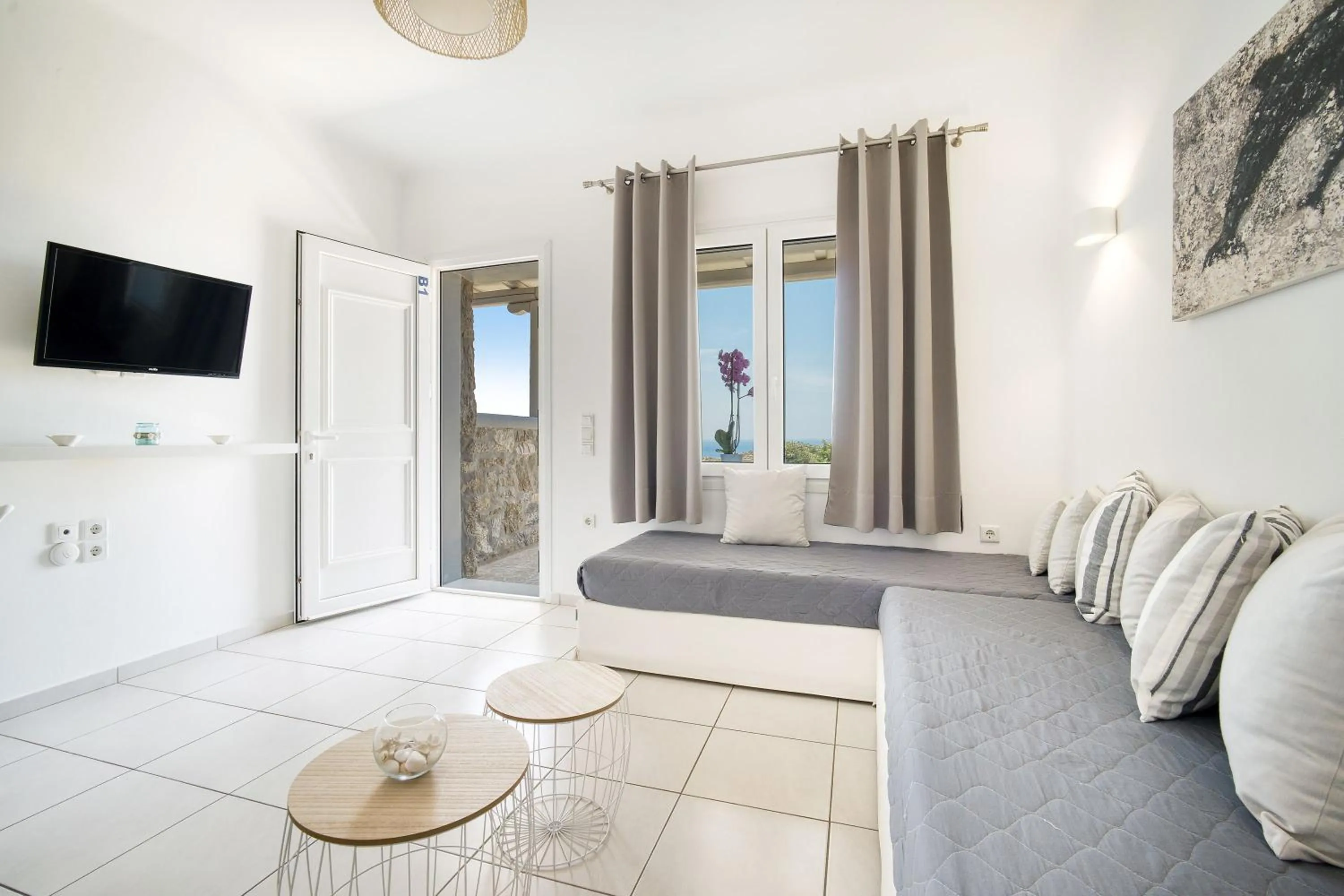 Seating area, Bed in Overview Mykonos Apartments