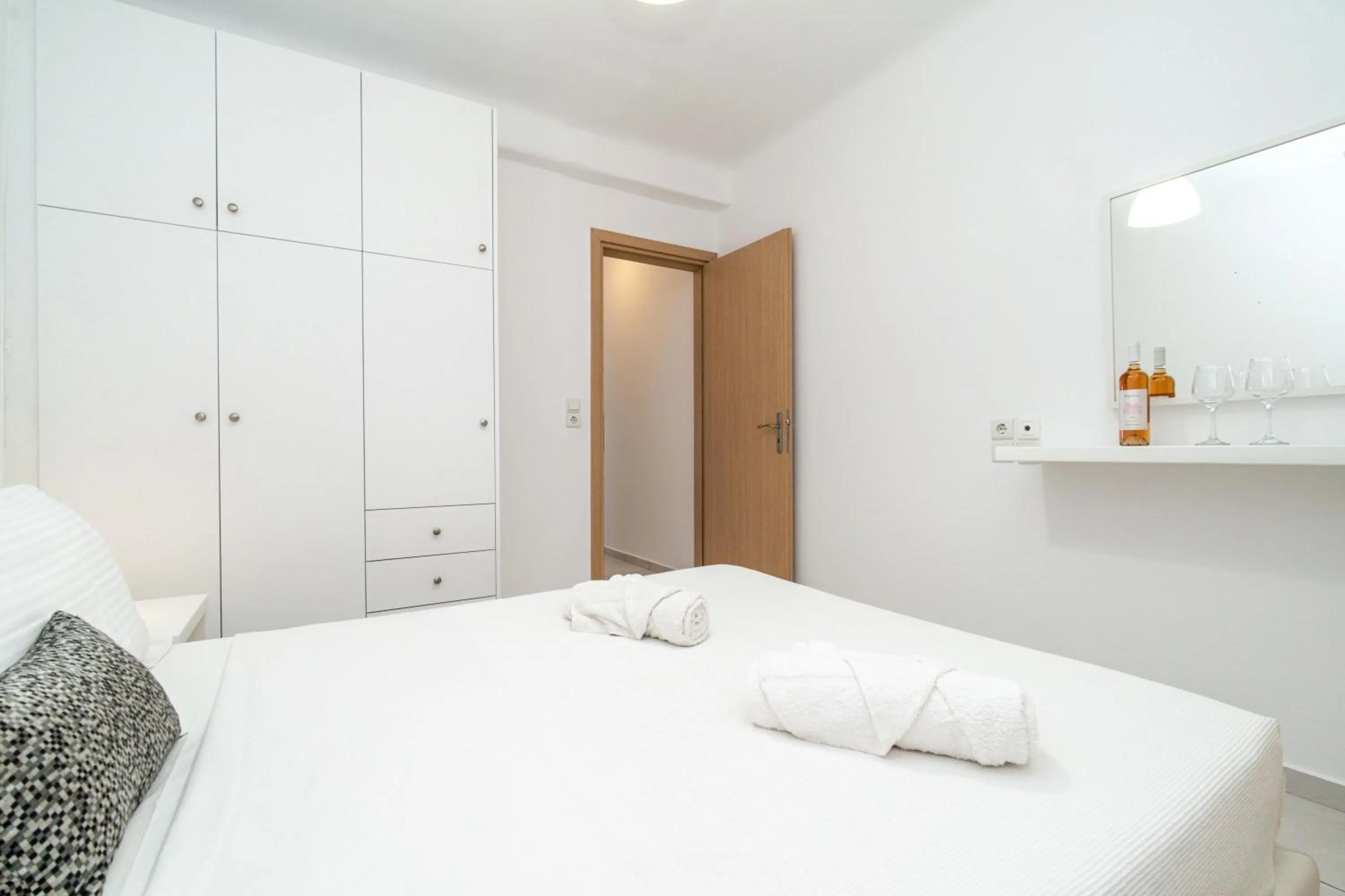 Bed in Overview Mykonos Apartments