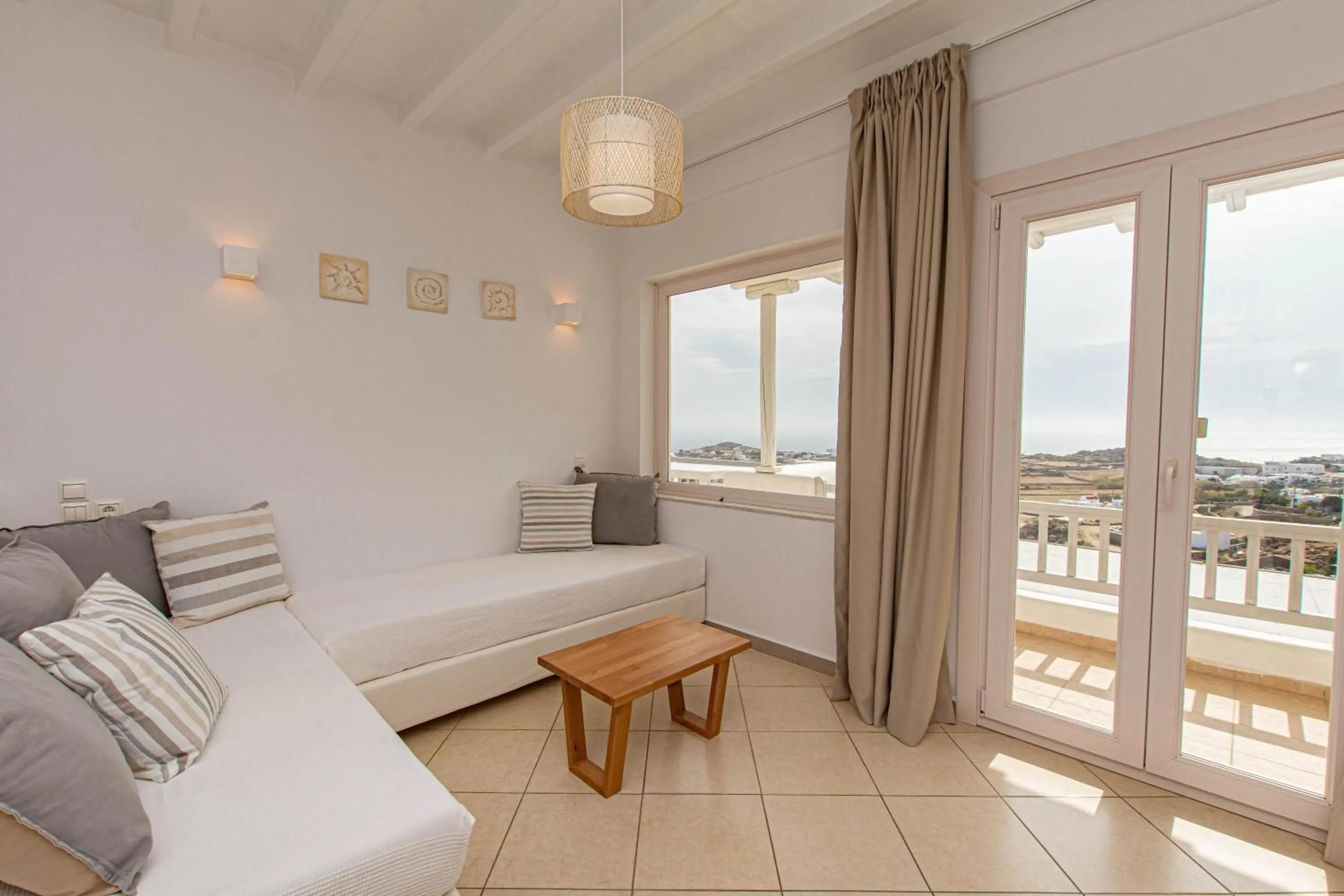 Seating area, Bed in Overview Mykonos Apartments