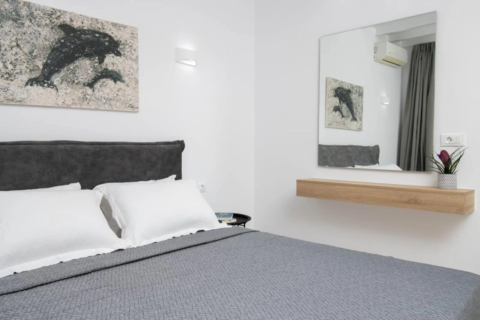 Bed in Overview Mykonos Apartments