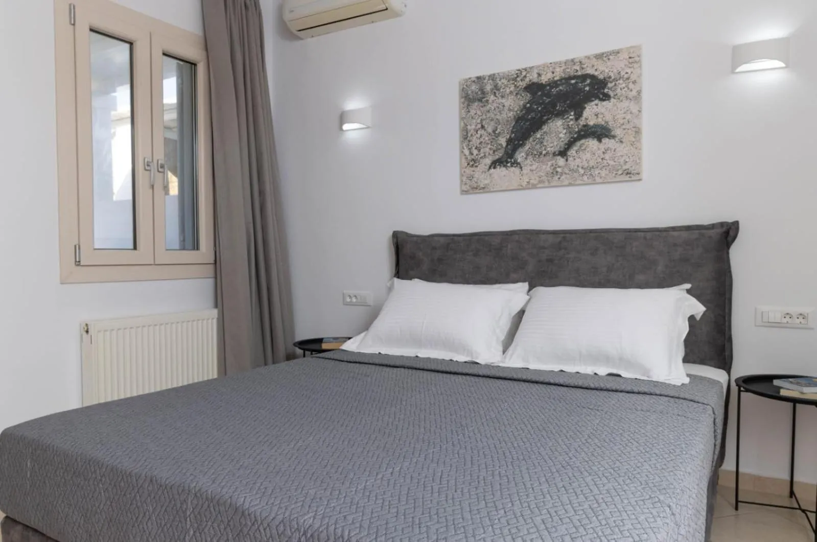 Bed in Overview Mykonos Apartments