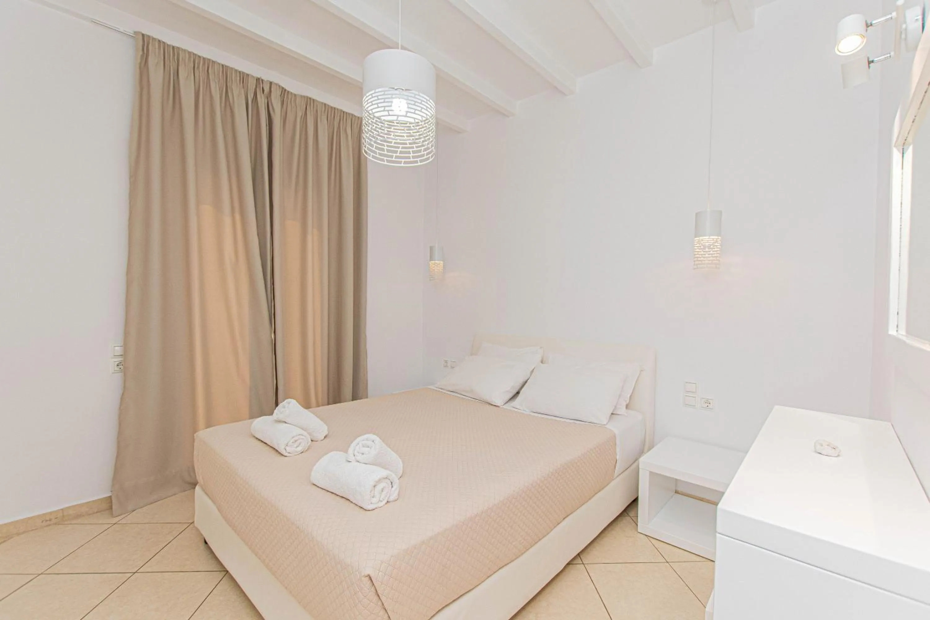 Bedroom, Bed in Overview Mykonos Apartments