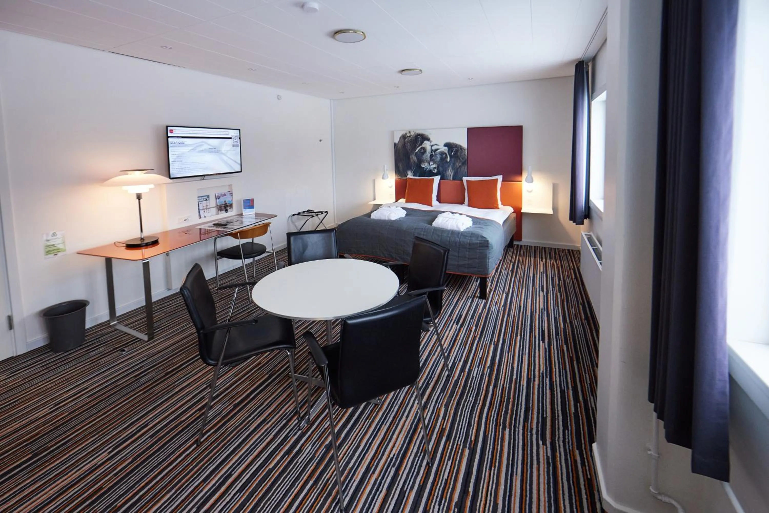 Living room, Bed in Hotel Hans Egede