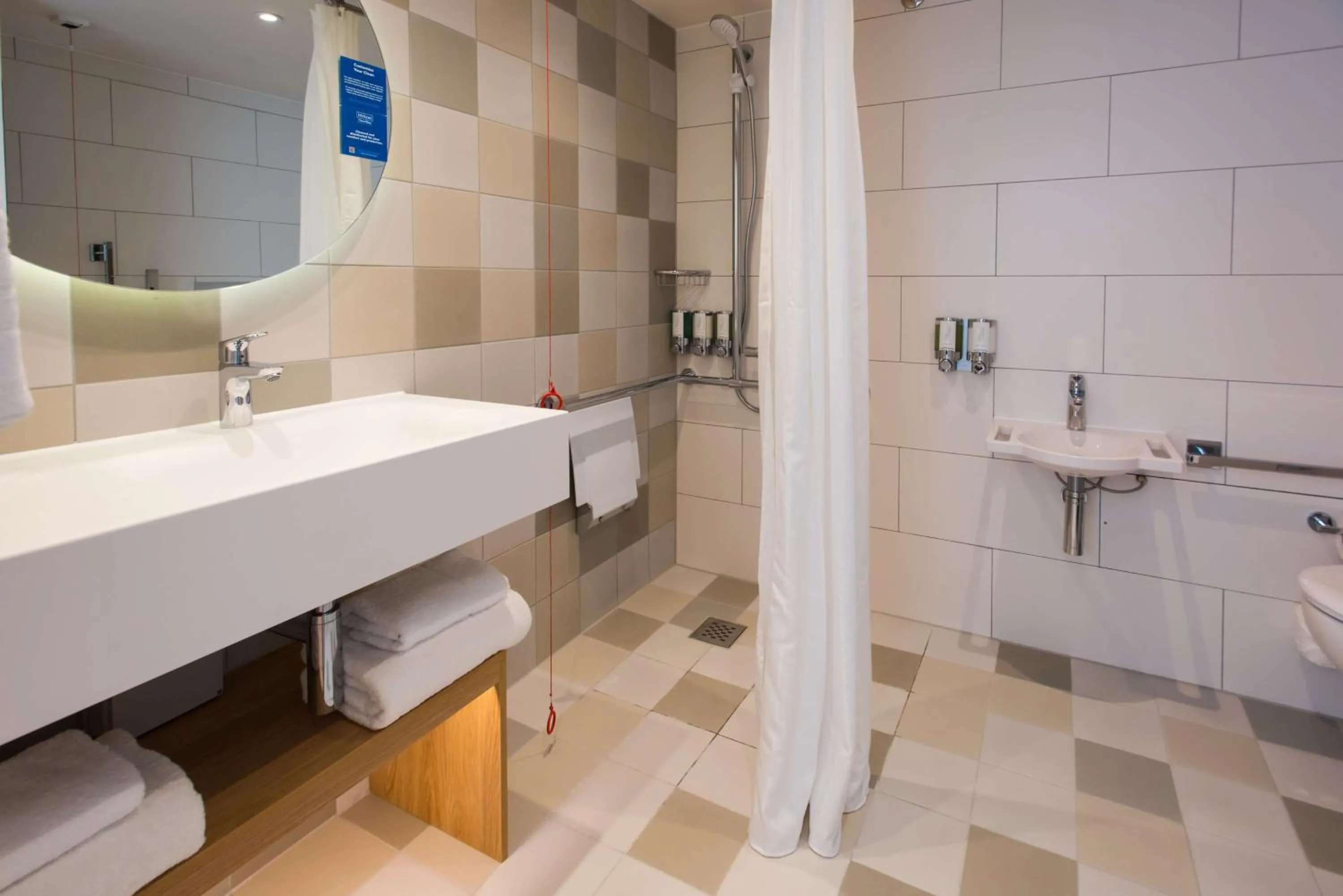 Shower in Hampton by Hilton London Park Royal