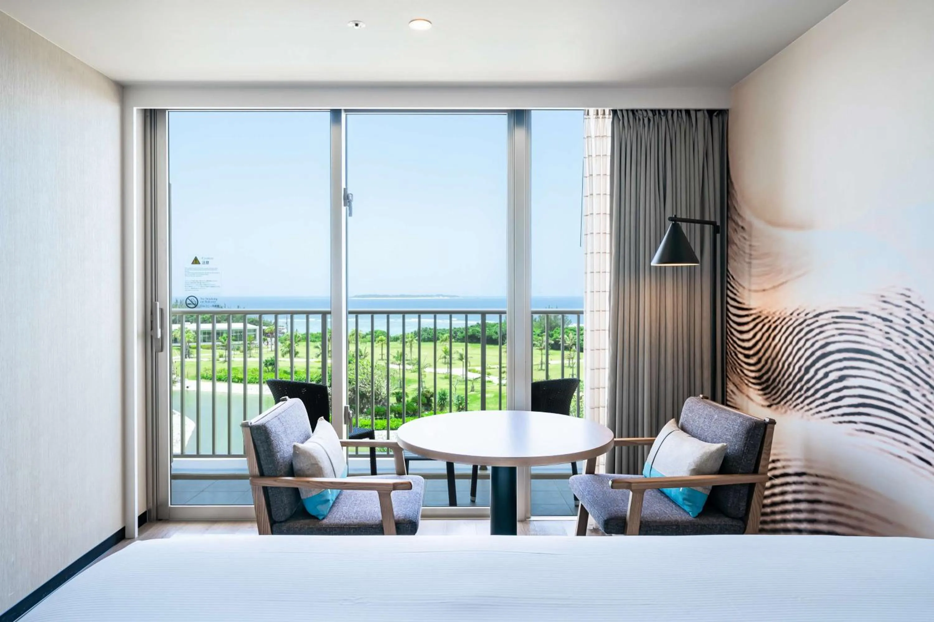 Photo of the whole room, Bed in Hilton Okinawa Sesoko Resort