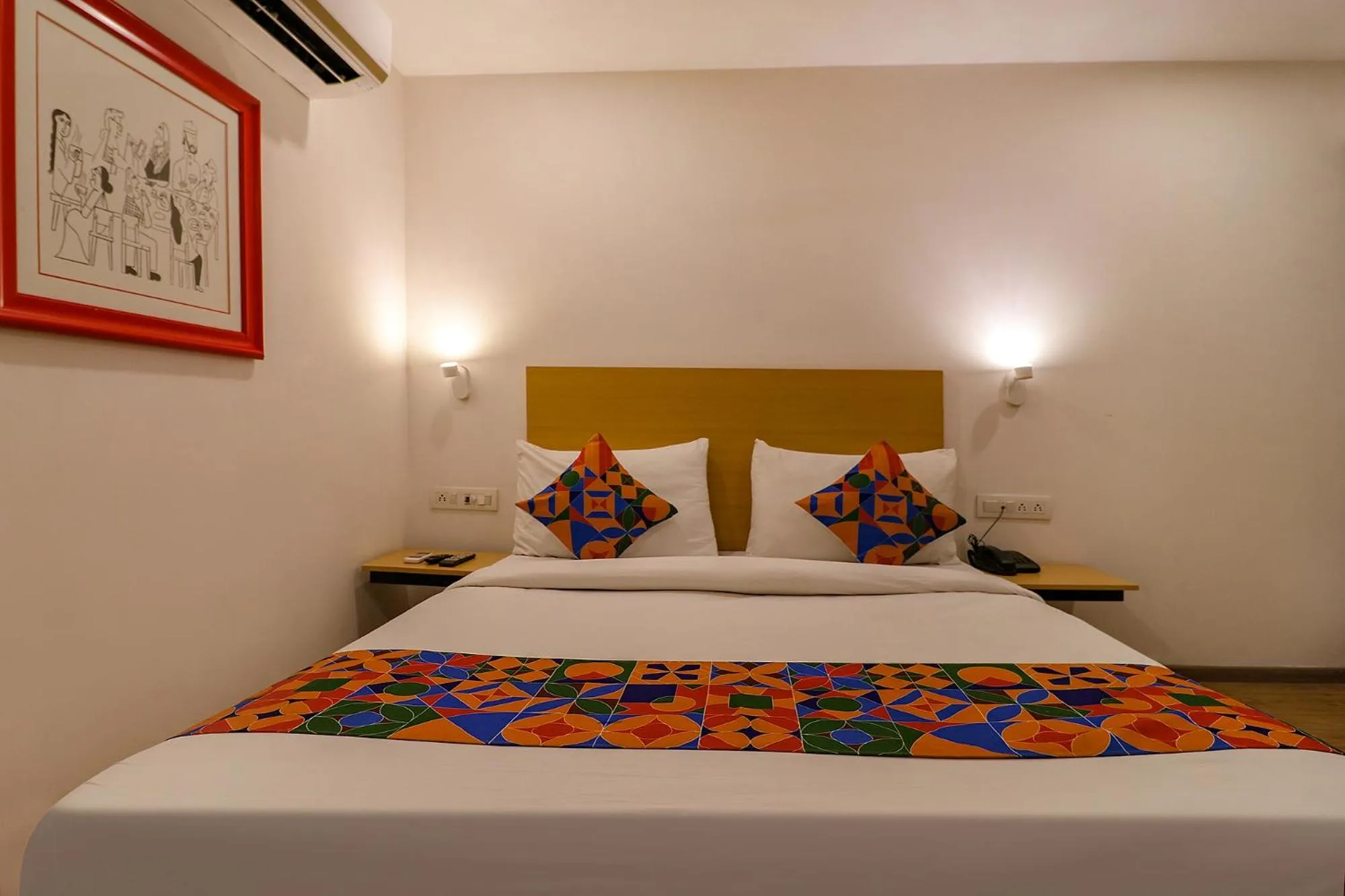 Bed in FabHotel Hargobind Enclave