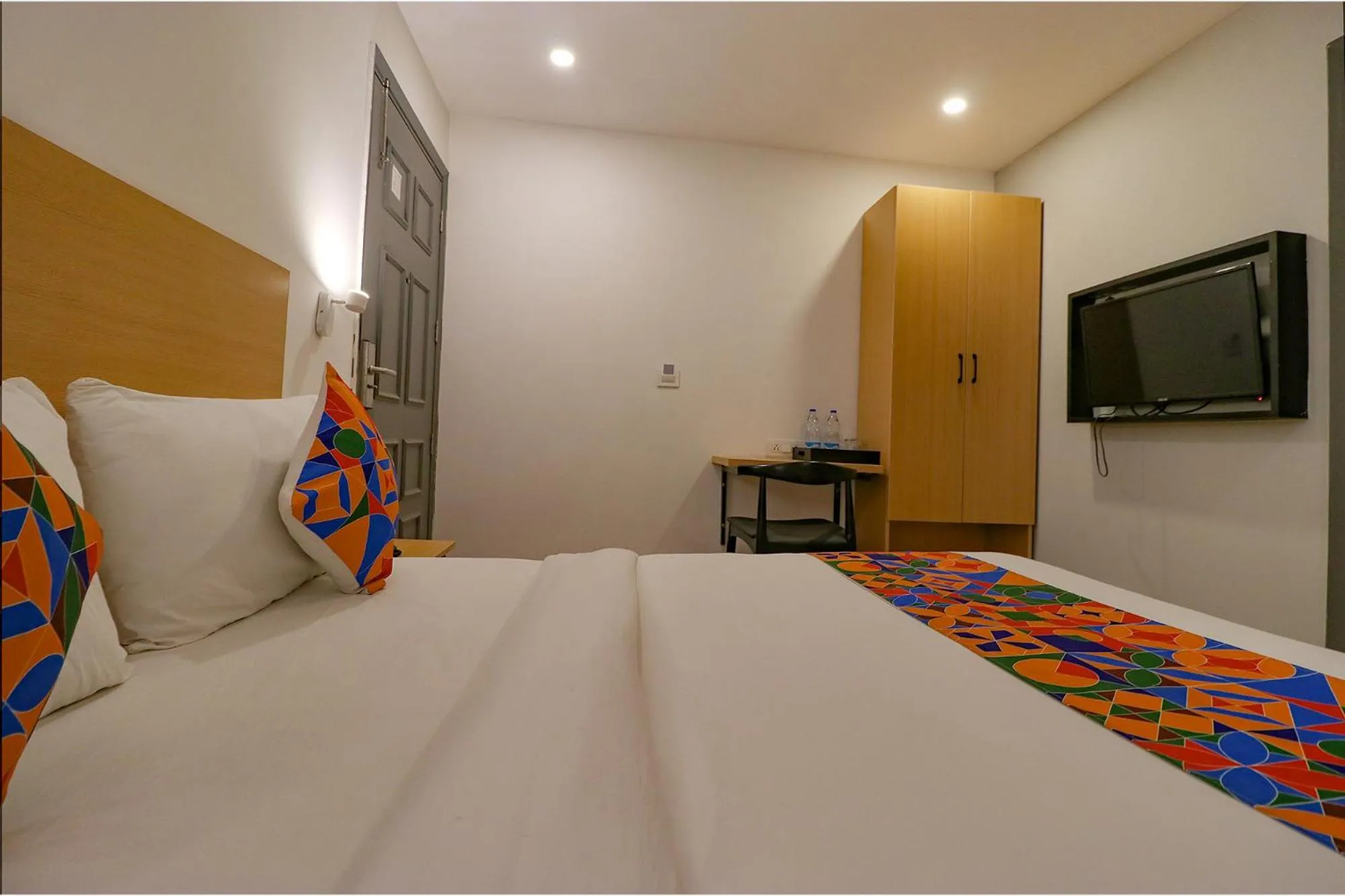 Bed in FabHotel Hargobind Enclave