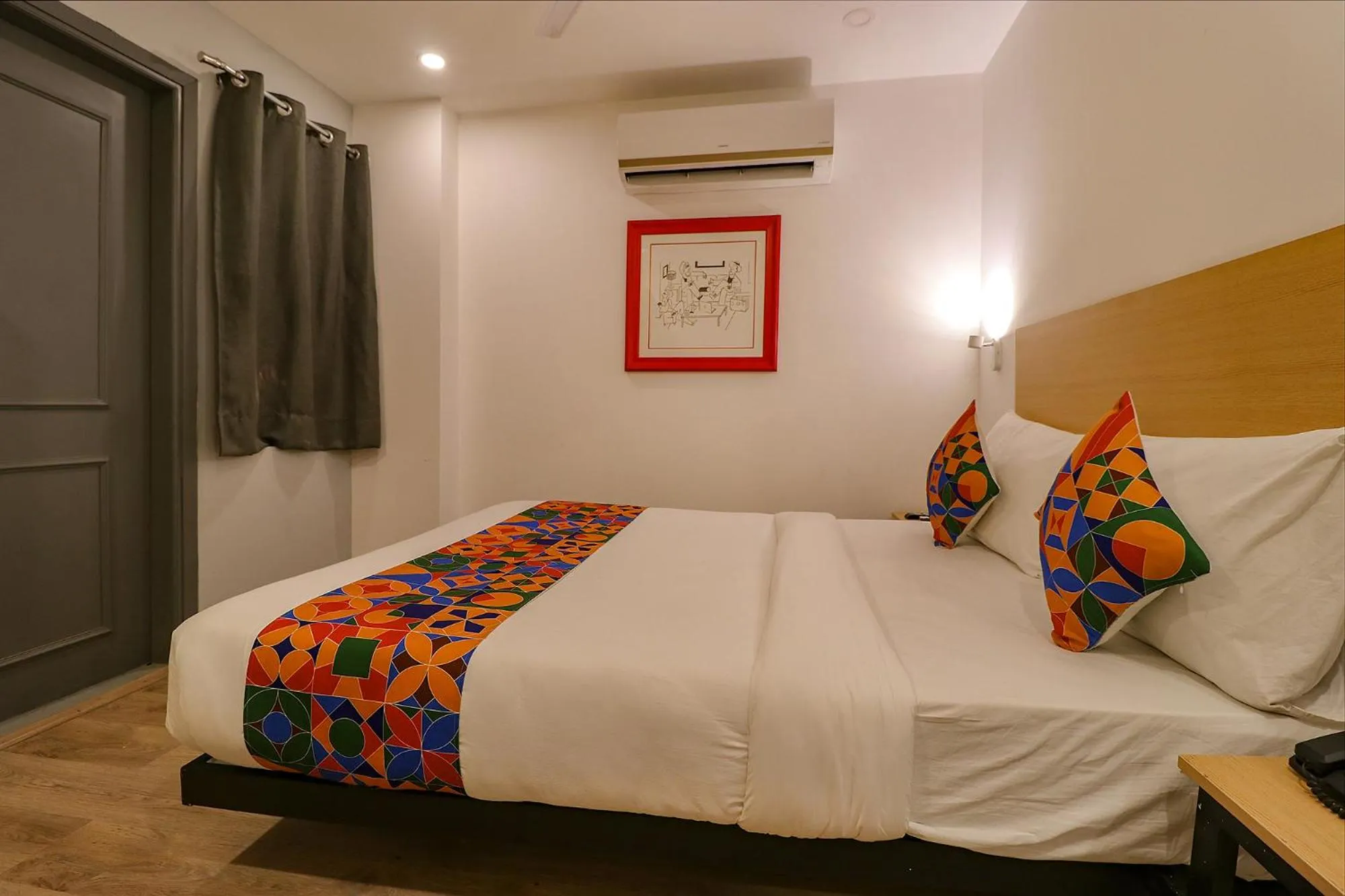 Bed in FabHotel Hargobind Enclave