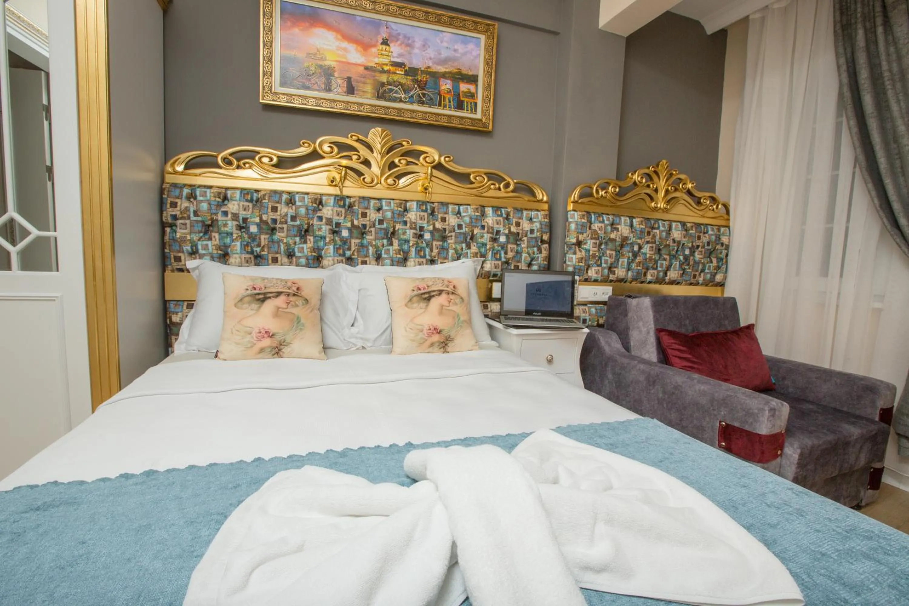 Bed in Atlantis Royal Hotel