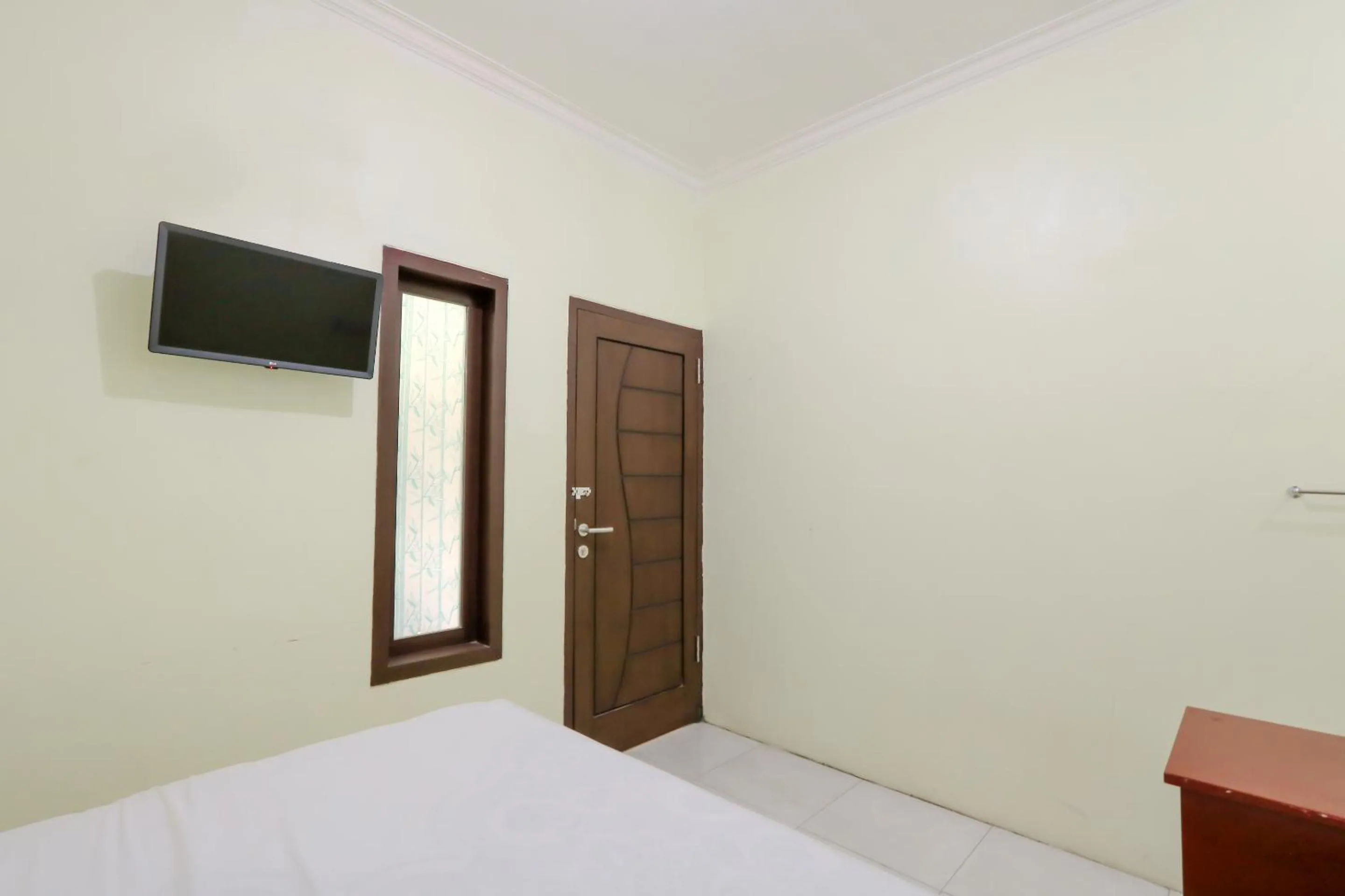Bed in Zulfina Homestay Syariah Mitra RedDoorz