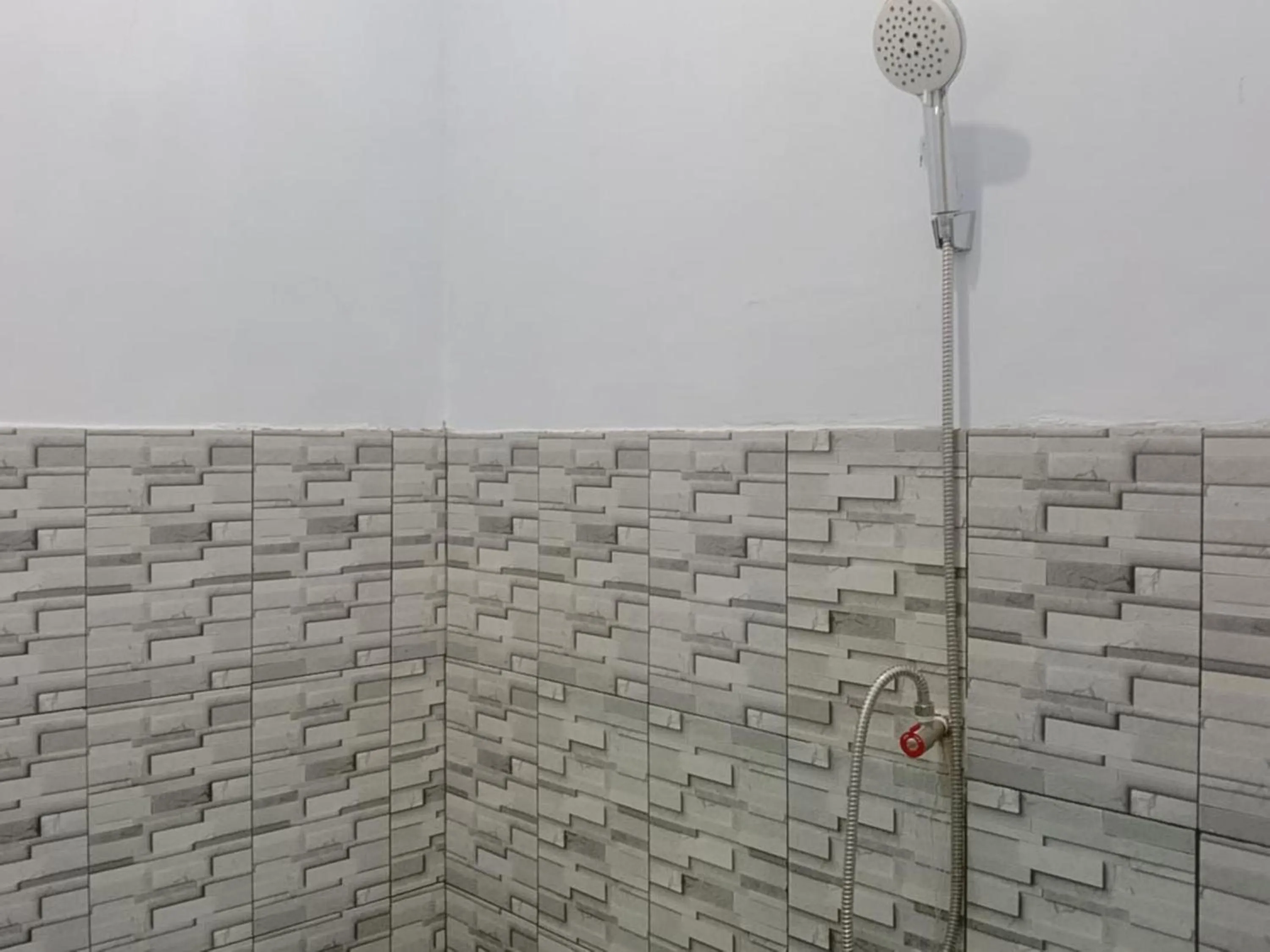 Bathroom in Zulfina Homestay Syariah Mitra RedDoorz