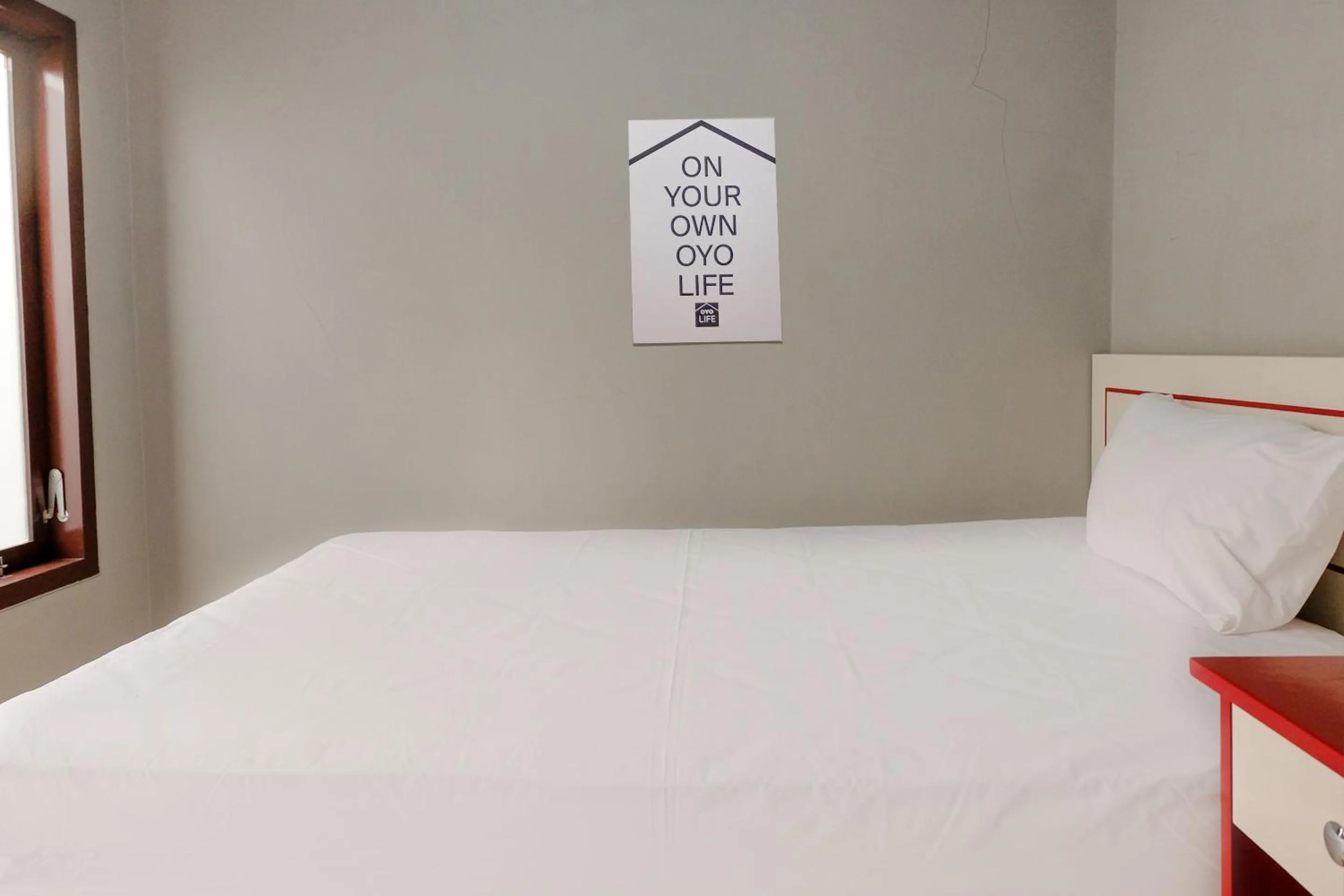 Bed in Zulfina Homestay Syariah Mitra RedDoorz