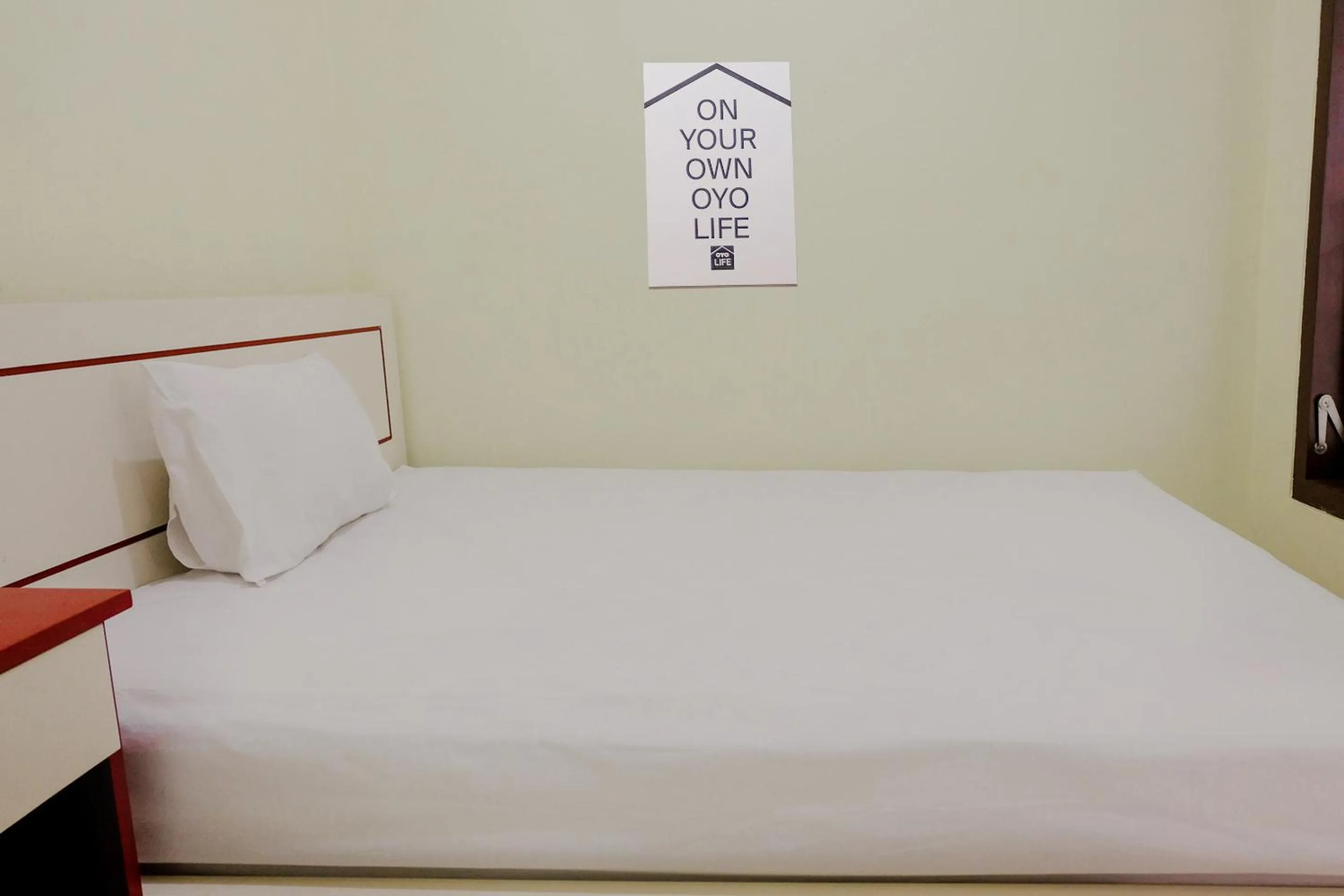 Bed in Zulfina Homestay Syariah Mitra RedDoorz