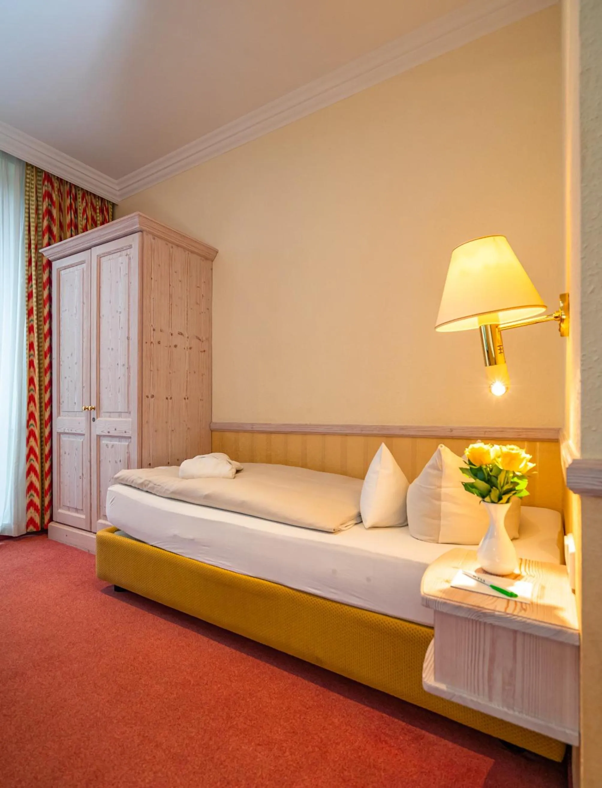 Photo of the whole room, Bed in Parkhotel Traunstein