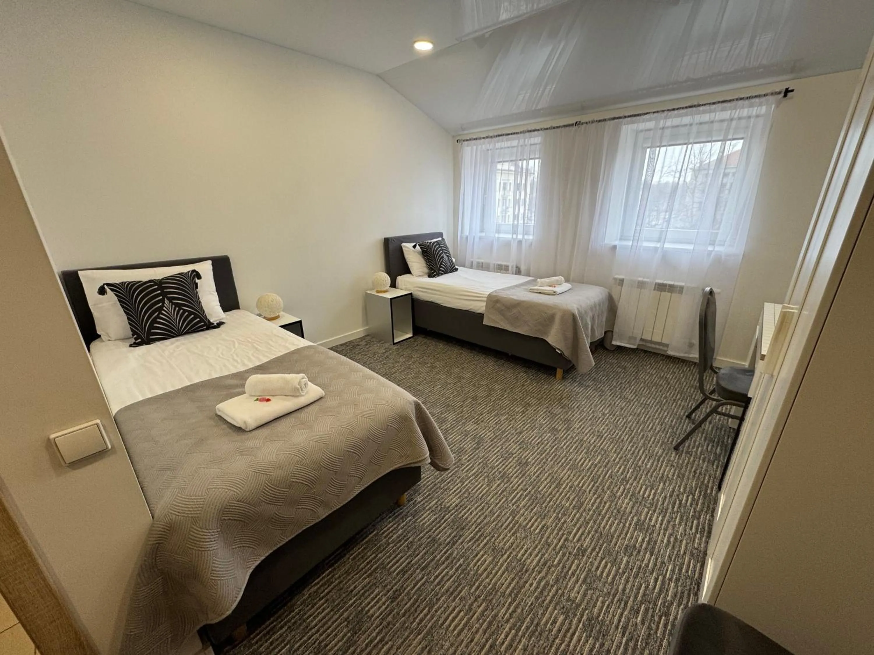 Photo of the whole room, Bed in Grey apartments "Easy Kaunas"