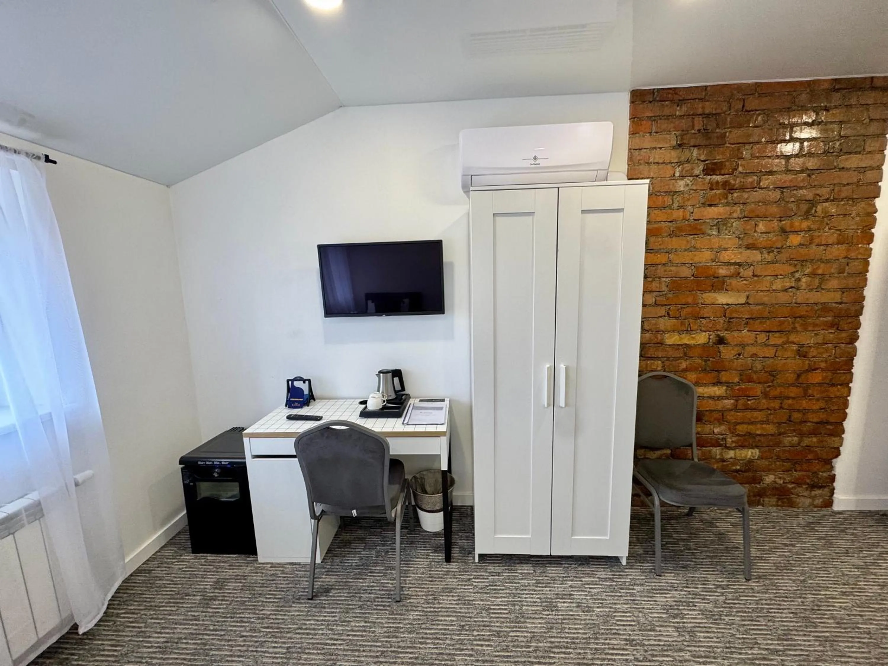 TV and multimedia in Grey apartments "Easy Kaunas"