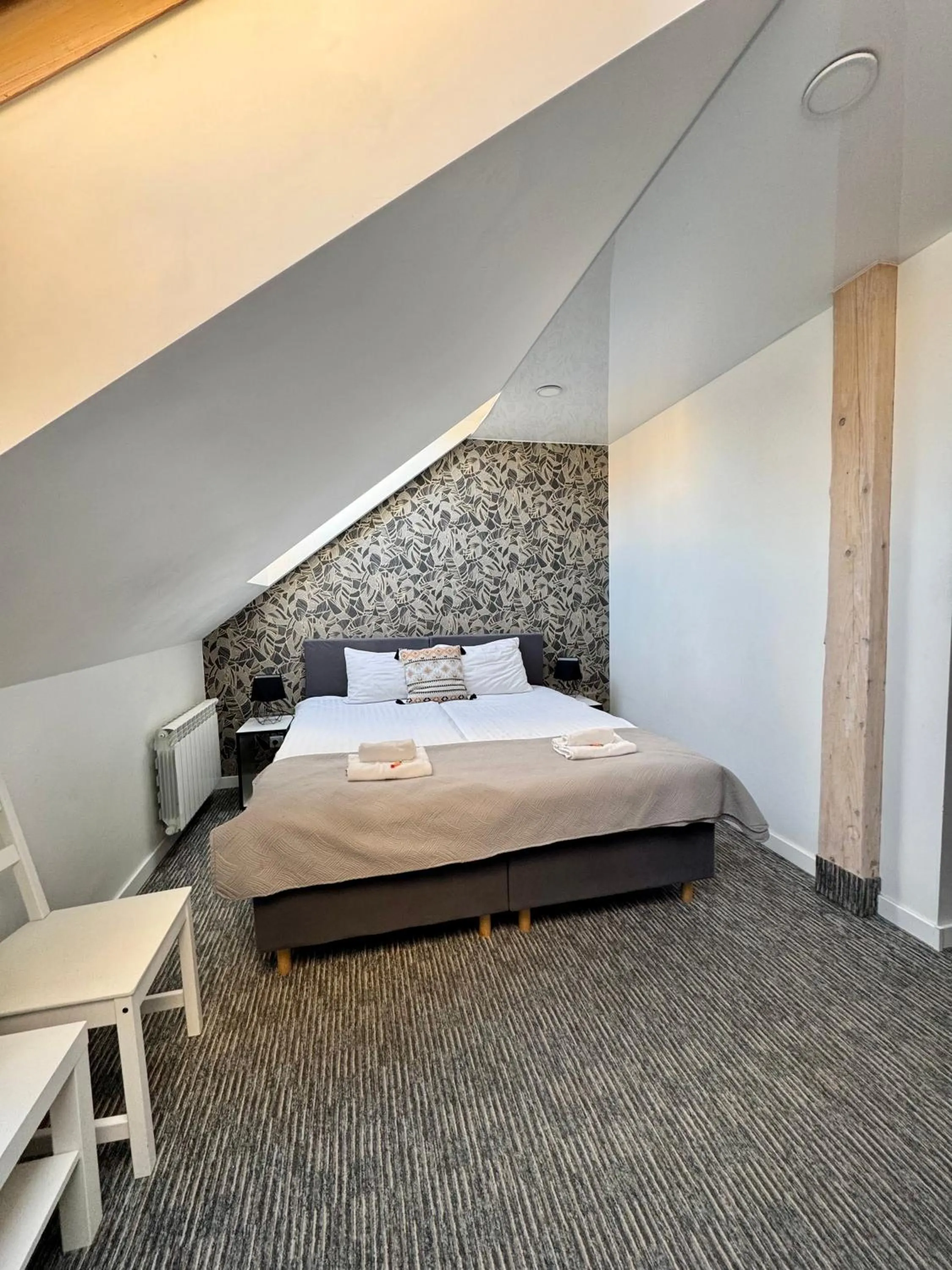 Bed in Grey apartments "Easy Kaunas"