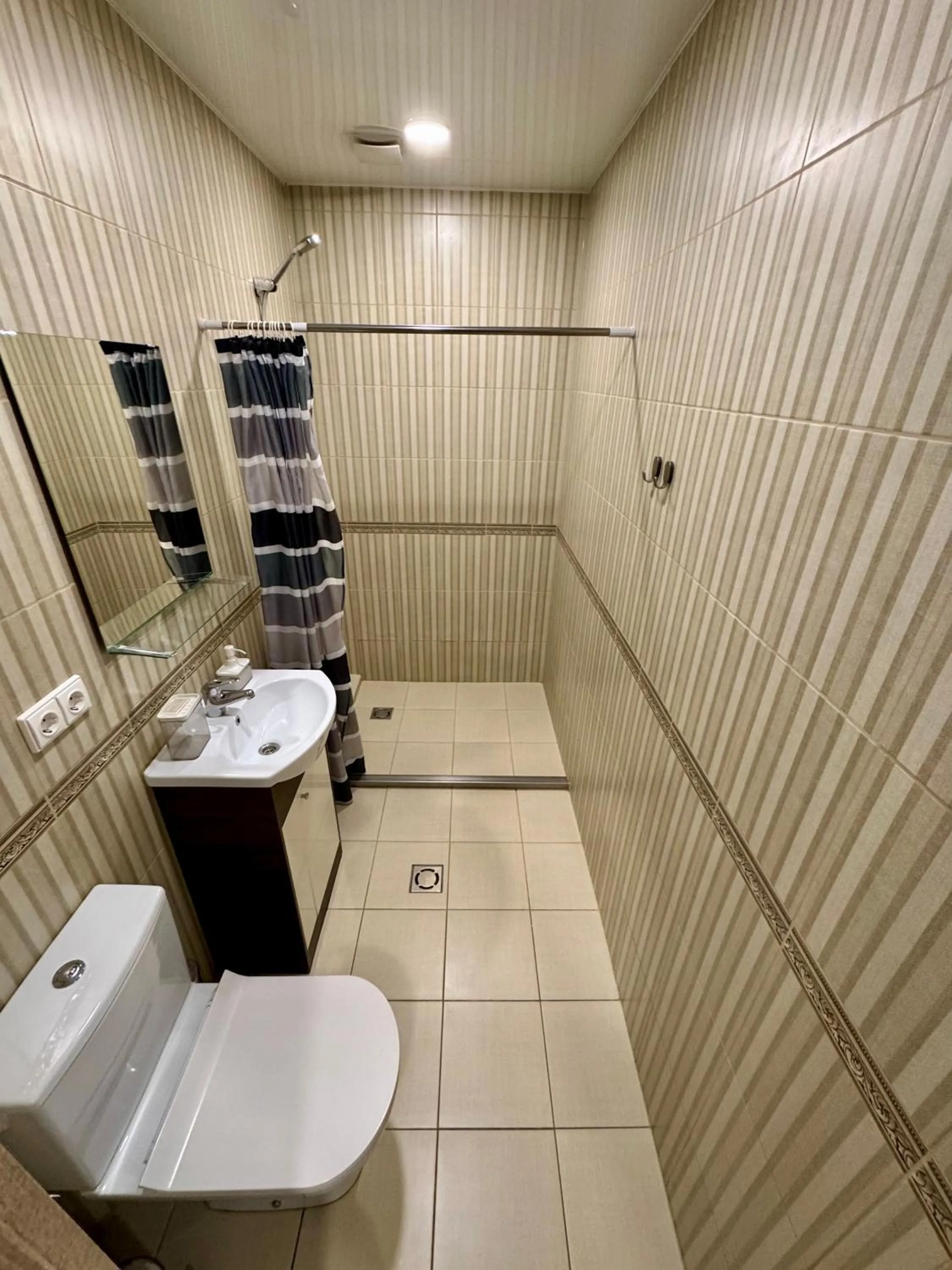 Shower in Grey apartments "Easy Kaunas"