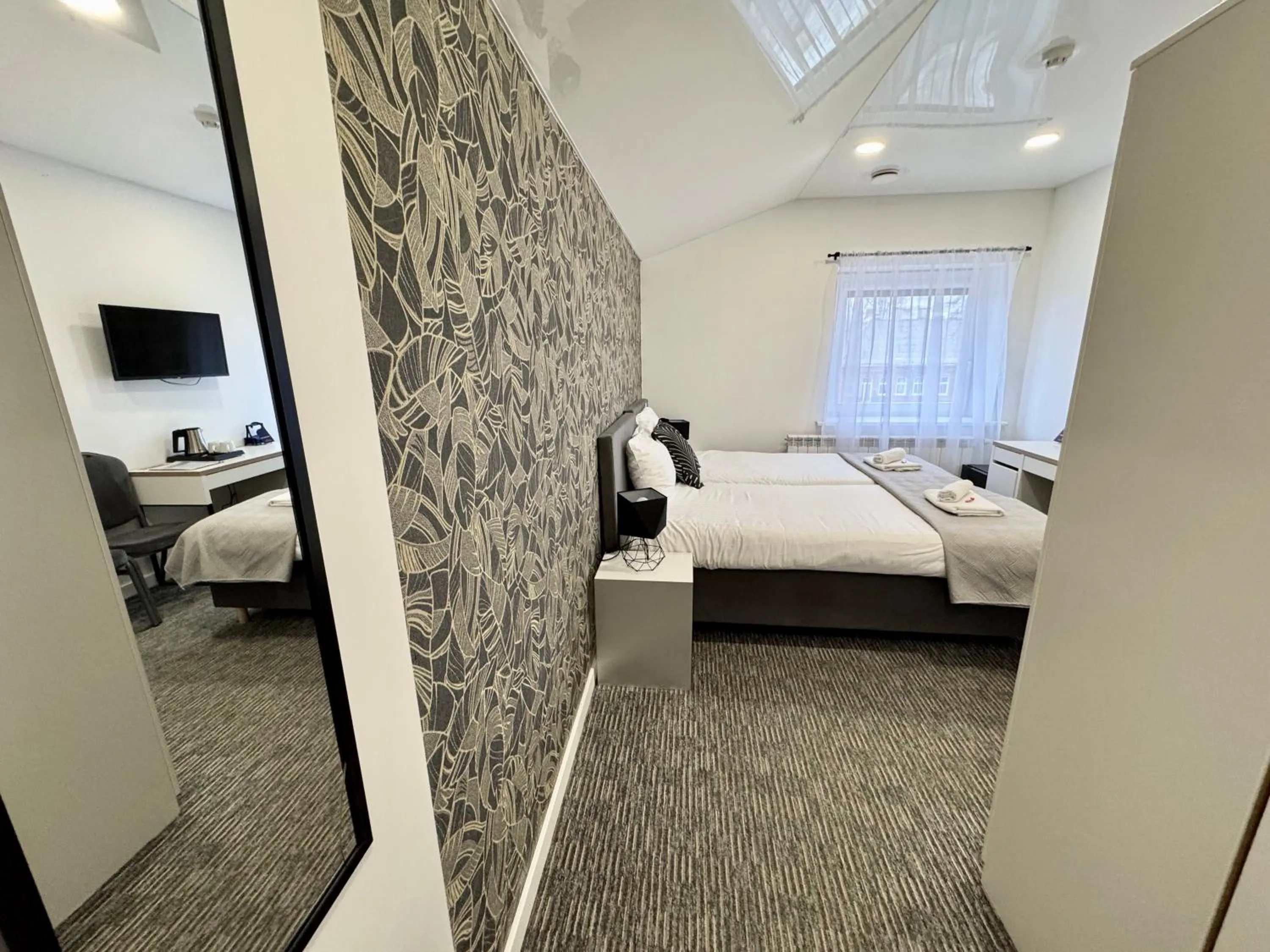 Bed in Grey apartments "Easy Kaunas"