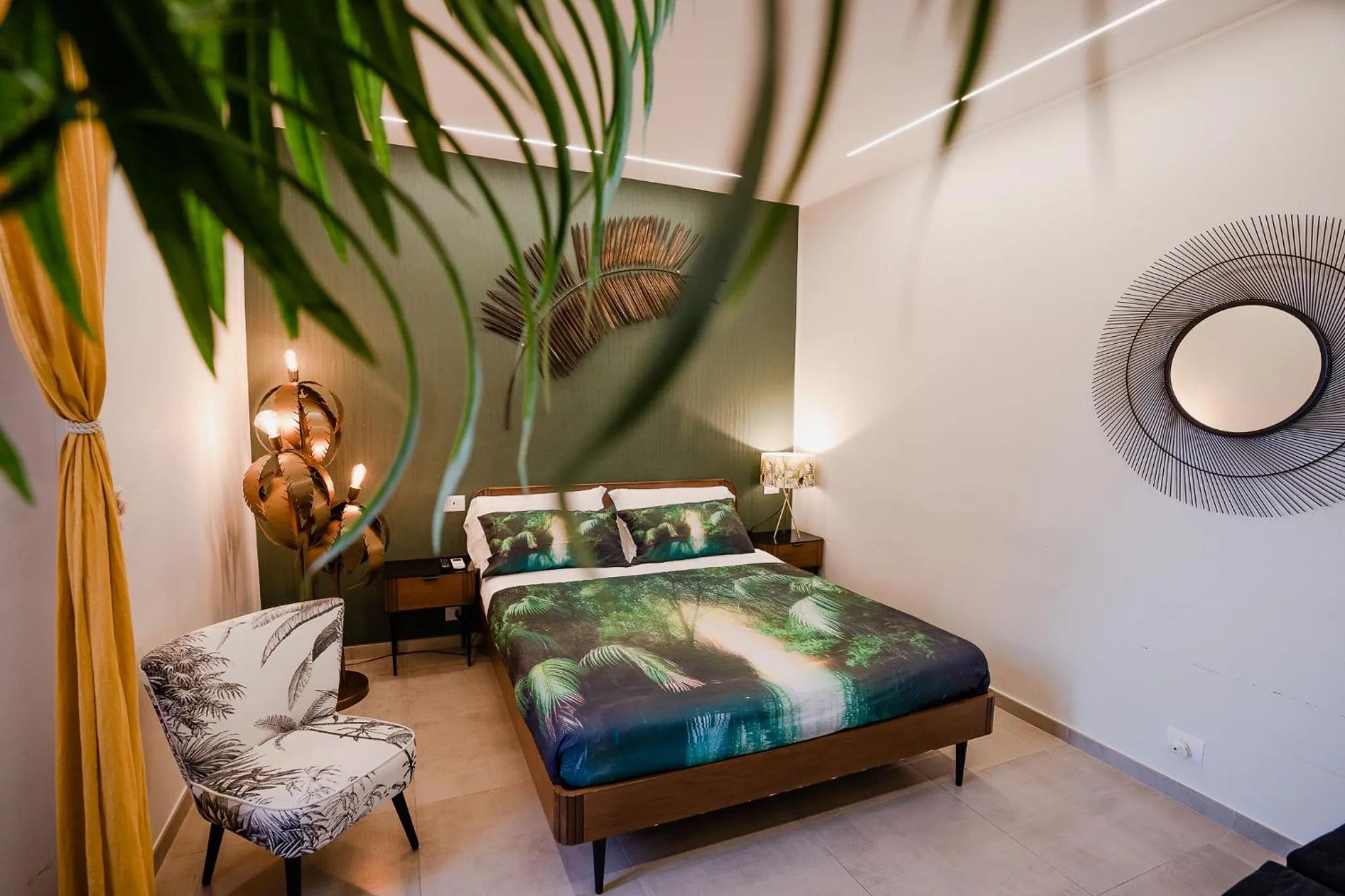 Bed in Le Boutique Luxury Rooms diffused in Historic Center
