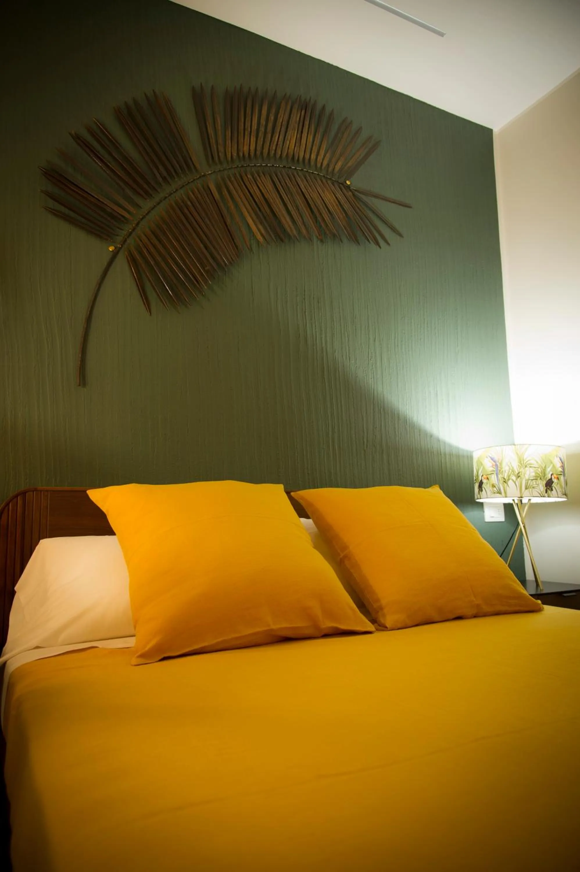 Bed in Le Boutique Luxury Rooms diffused in Historic Center