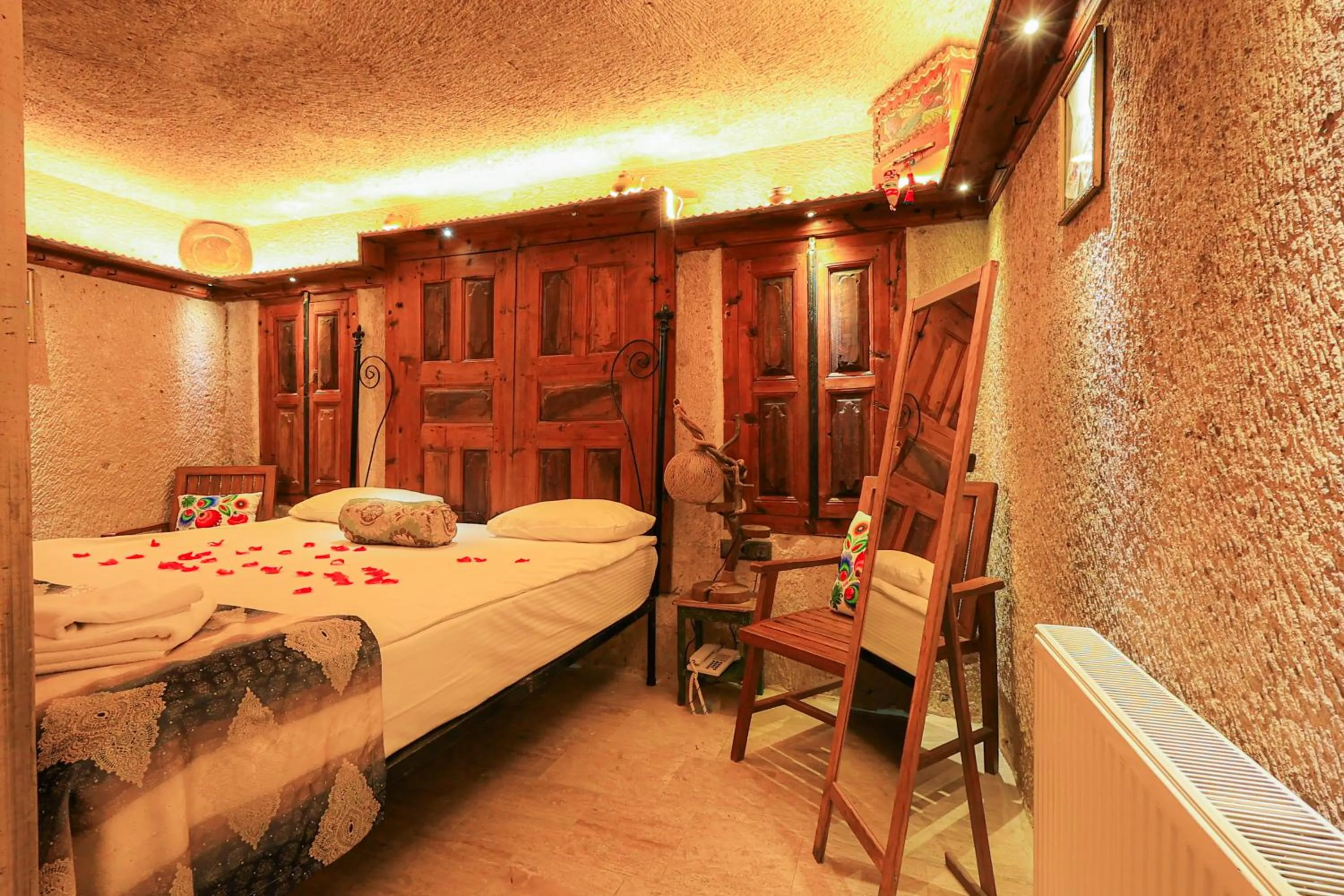 Bed in Casia Cave Suites