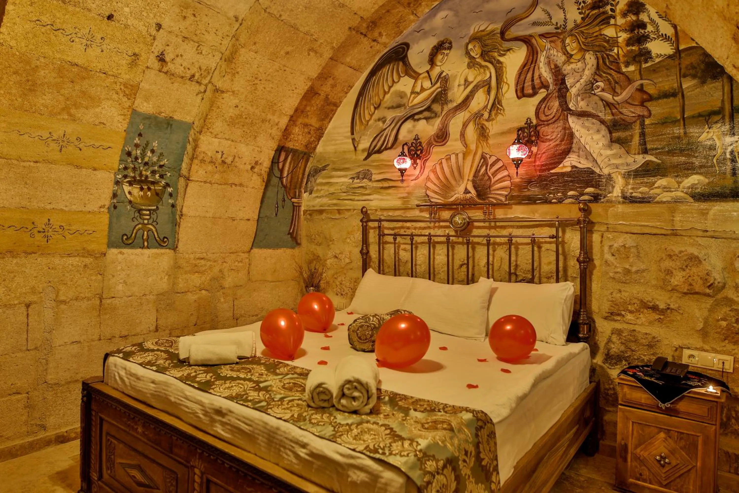 Bed in Casia Cave Suites
