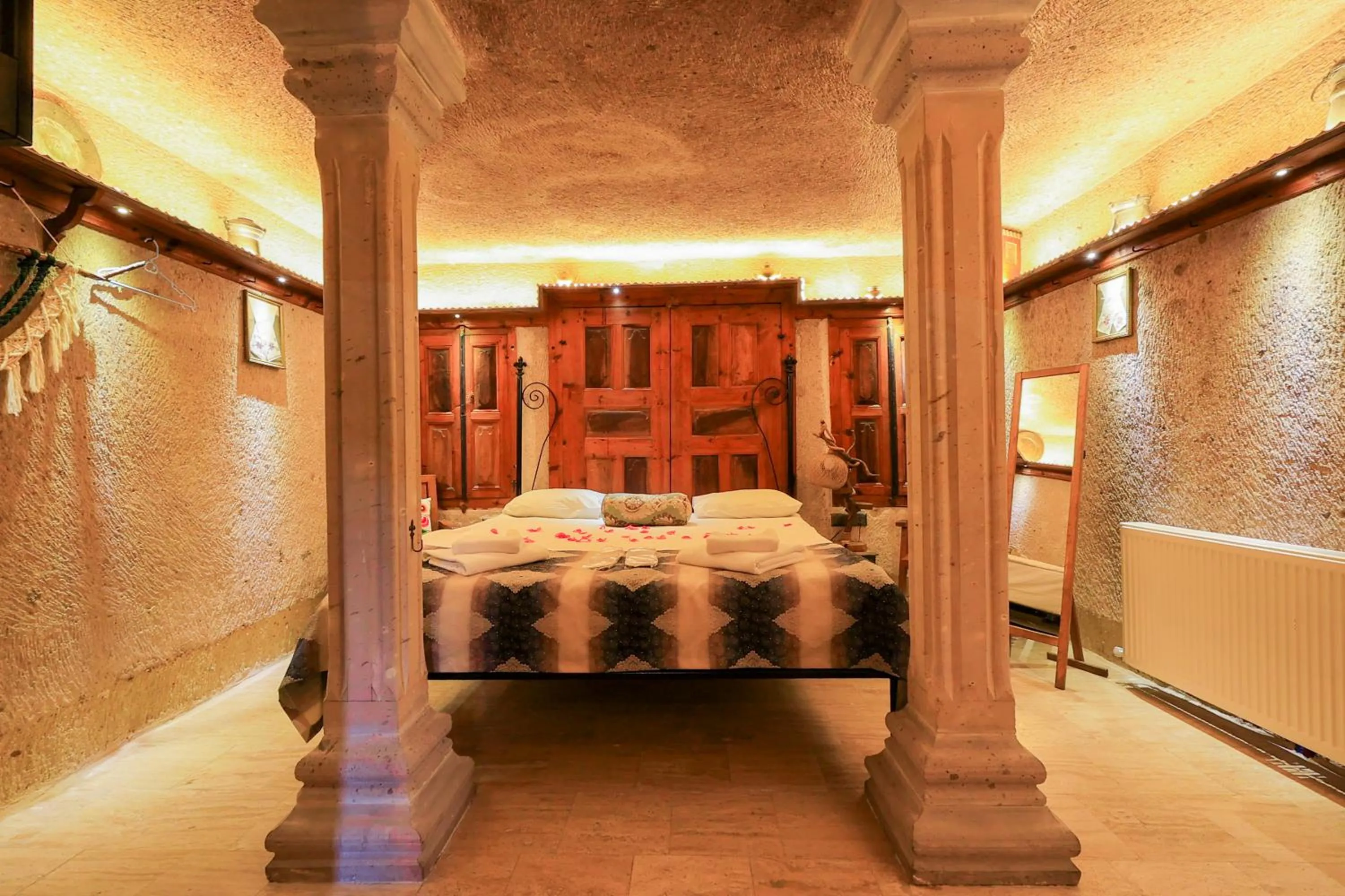 Bed in Casia Cave Suites